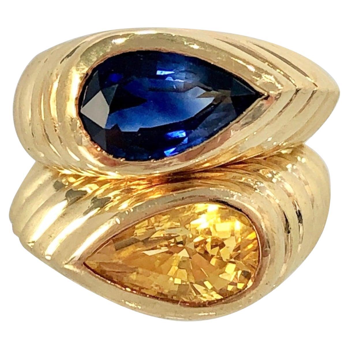 Pair of Fluted Gold Rings with Pear Shaped Blue and Yellow Sapphires by Niva For Sale