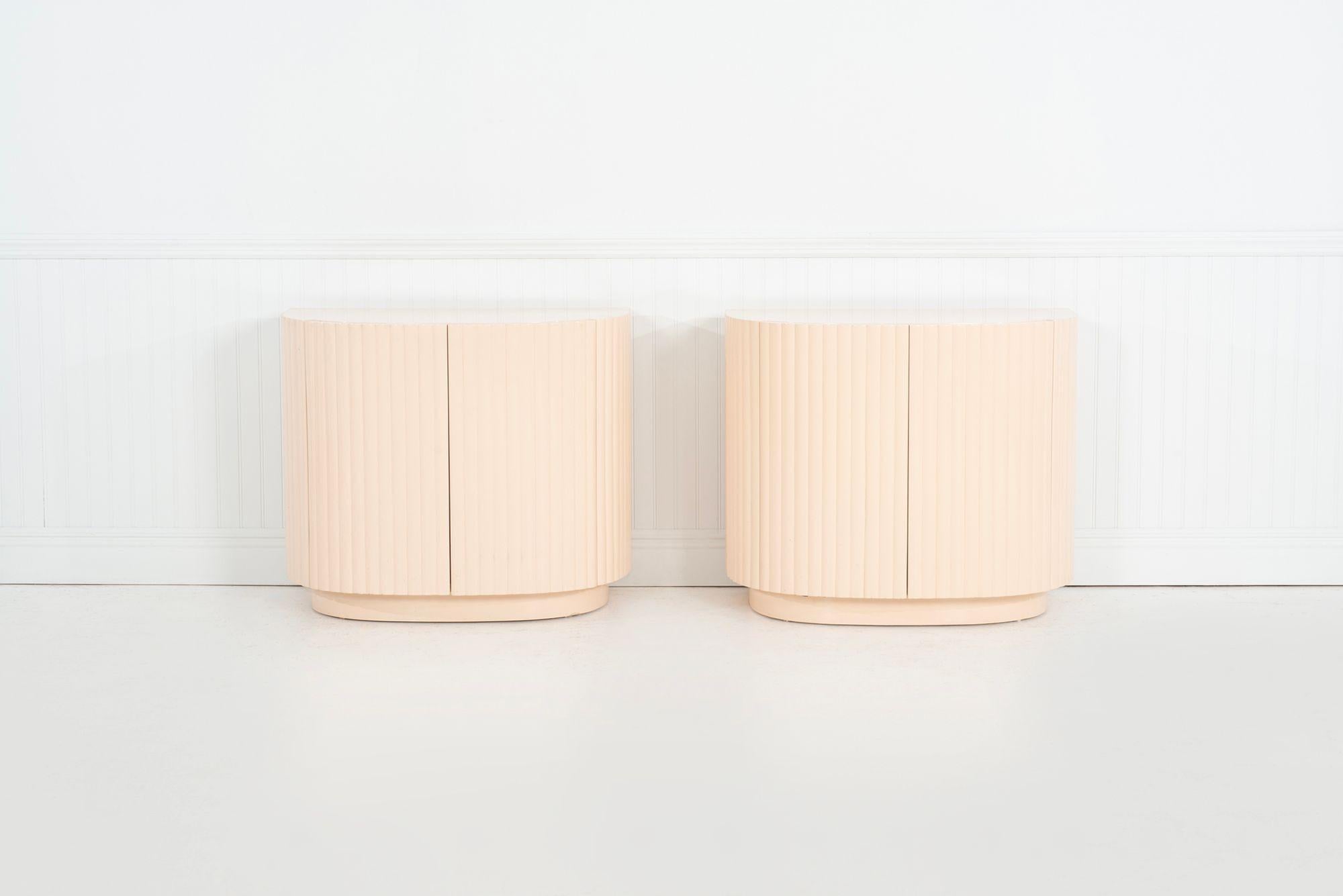Pair of Fluted Nightstands by Interior Crafts, 1989
Lacquered Samoan-finish cases on plinth bases, each with curved fluted doors concealing a single drawer and shelf. Elegant and sculptural design, showcasing Interior Crafts’ refined craftsmanship.