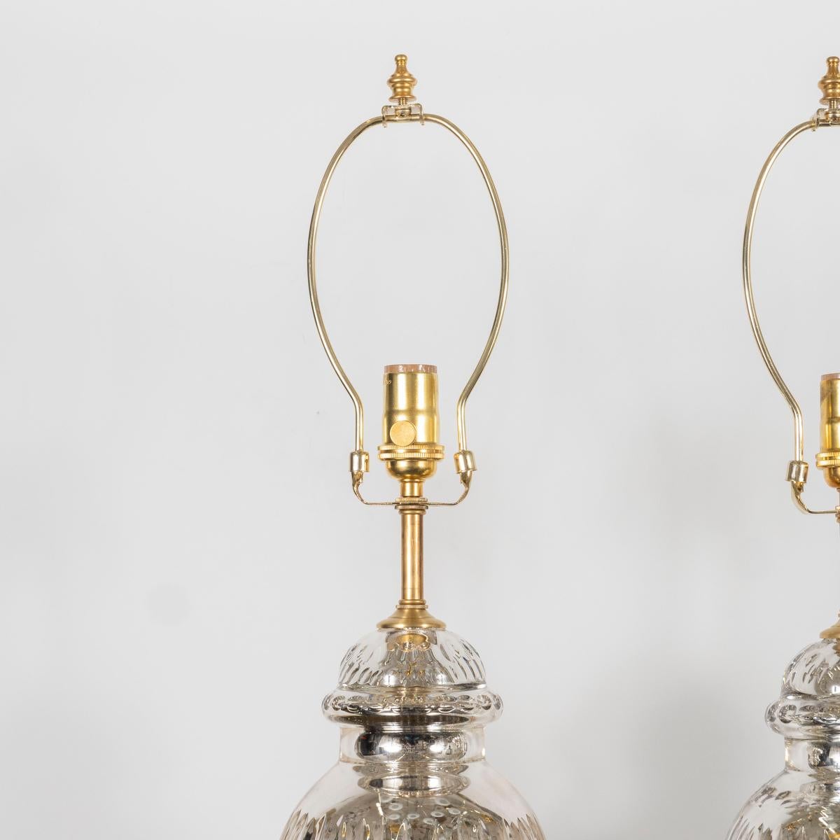 Brass Pair of Fluted Urn-Shaped Mercury Glass Lamps For Sale