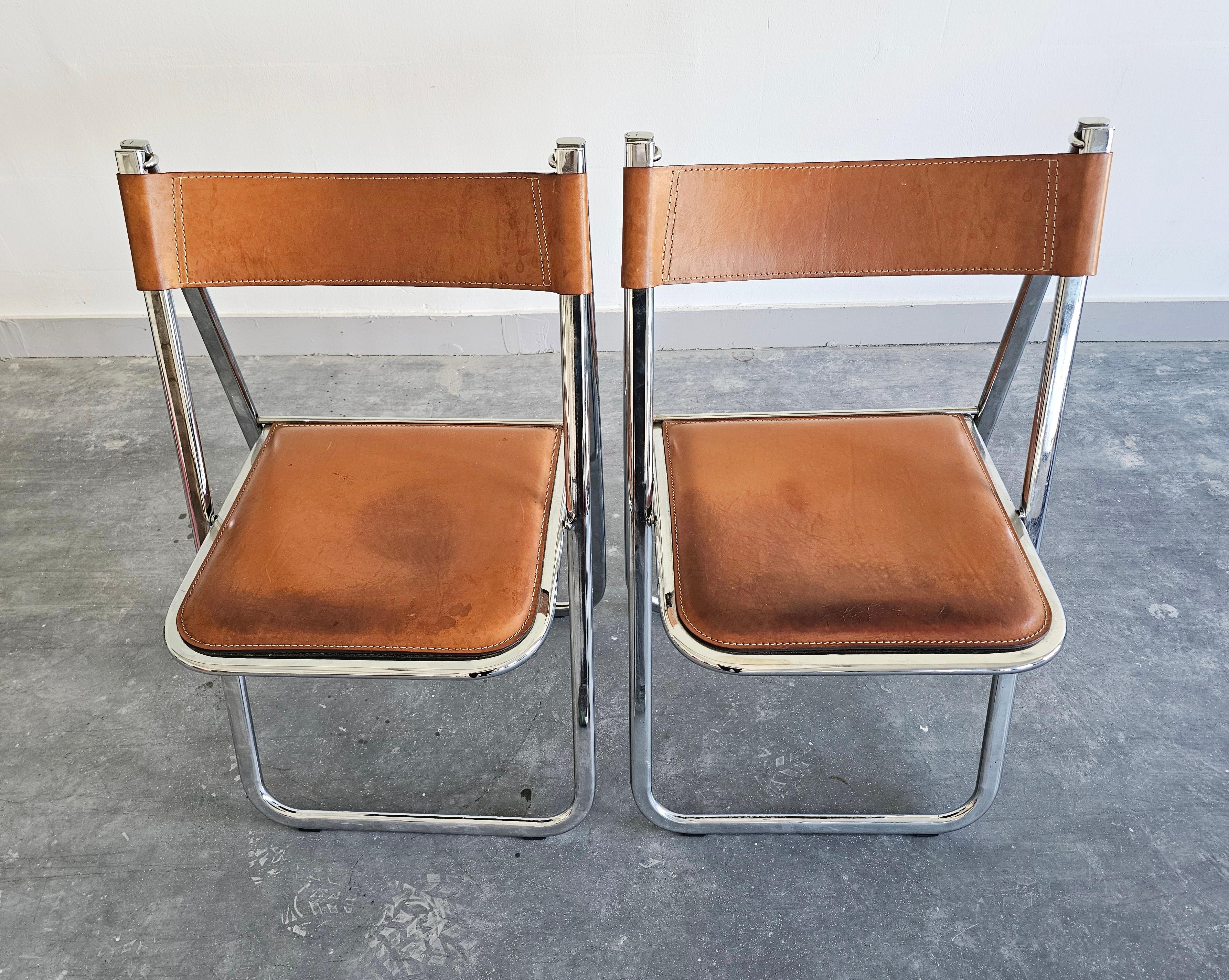 Italian Pair of Folding Chairs by Arrben, model Tamara, in cognac leather, Italy 1970s For Sale