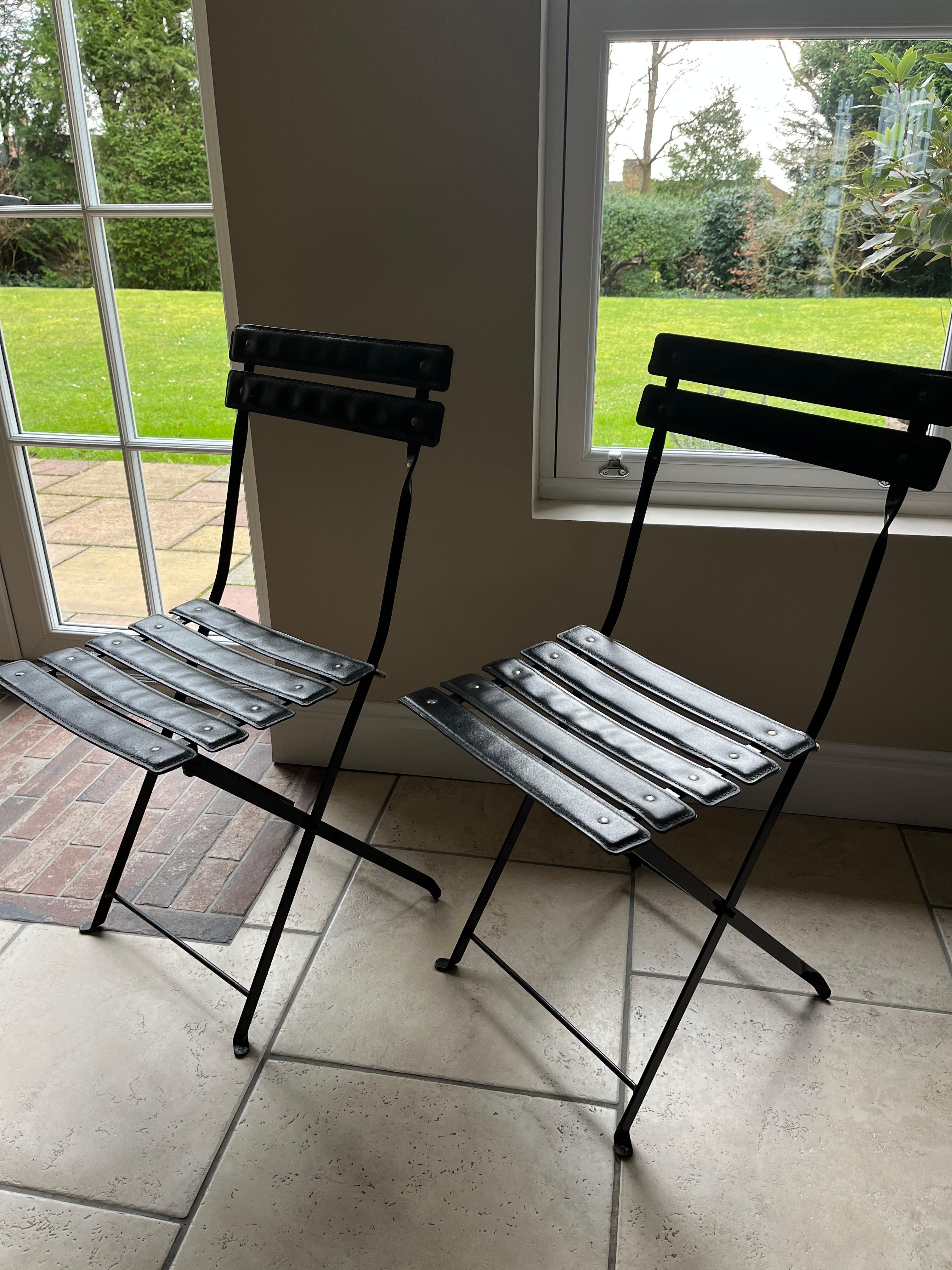 Metal Pair of folding chairs in the manner of Jacques Adnet