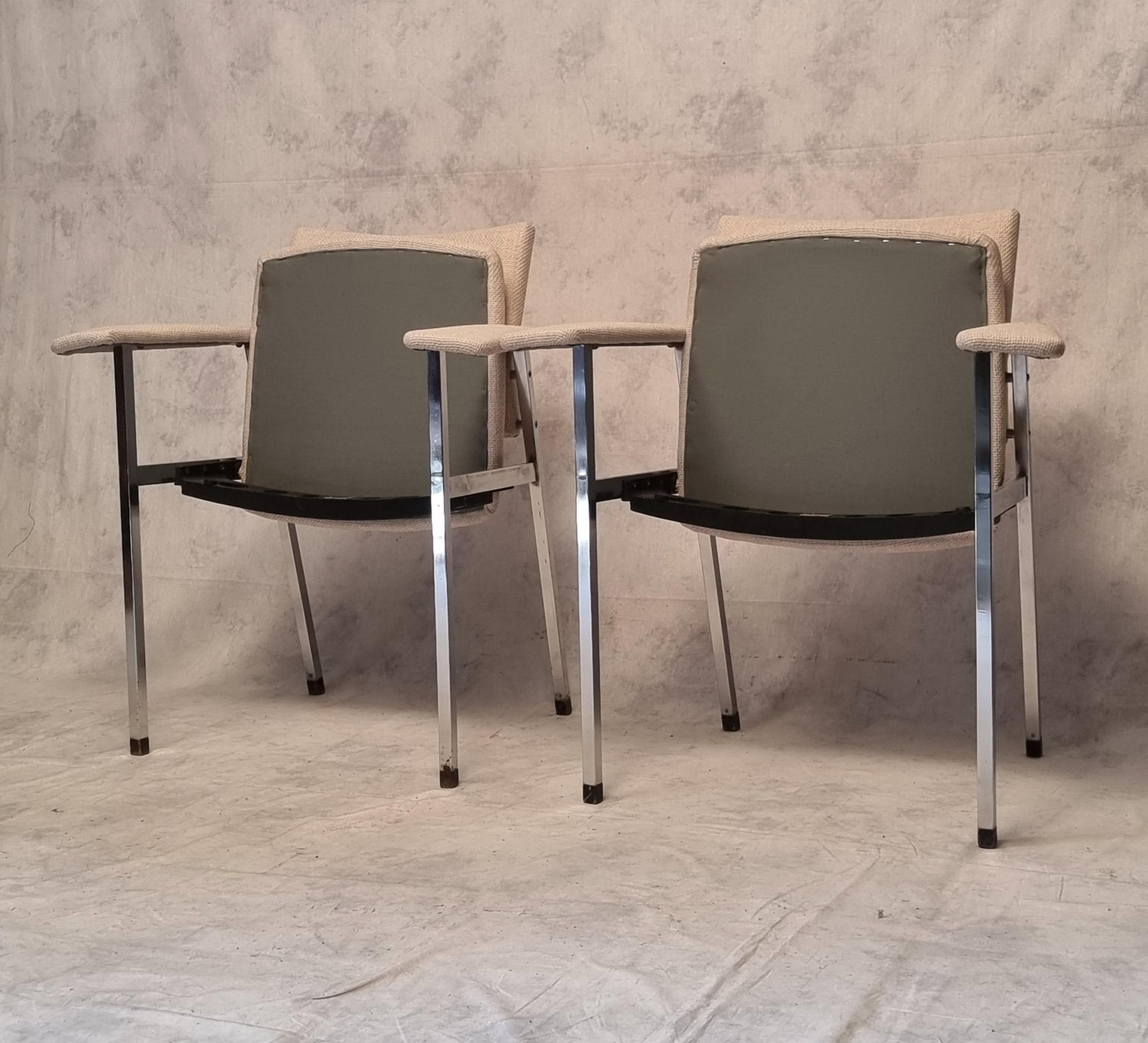 Very rare pair of Danish Fritz Hansen armchairs dating from the 1970s. This pair of jump seat armchairs is undoubtedly from a theatre, cinema or opera. Indeed the seat folds down and reveals a seat number as is frequently found in theaters or opera