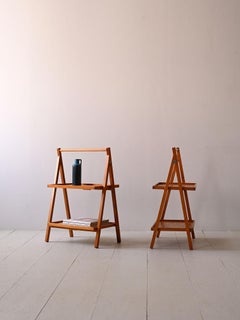 Pair of folding side tables with two shelves