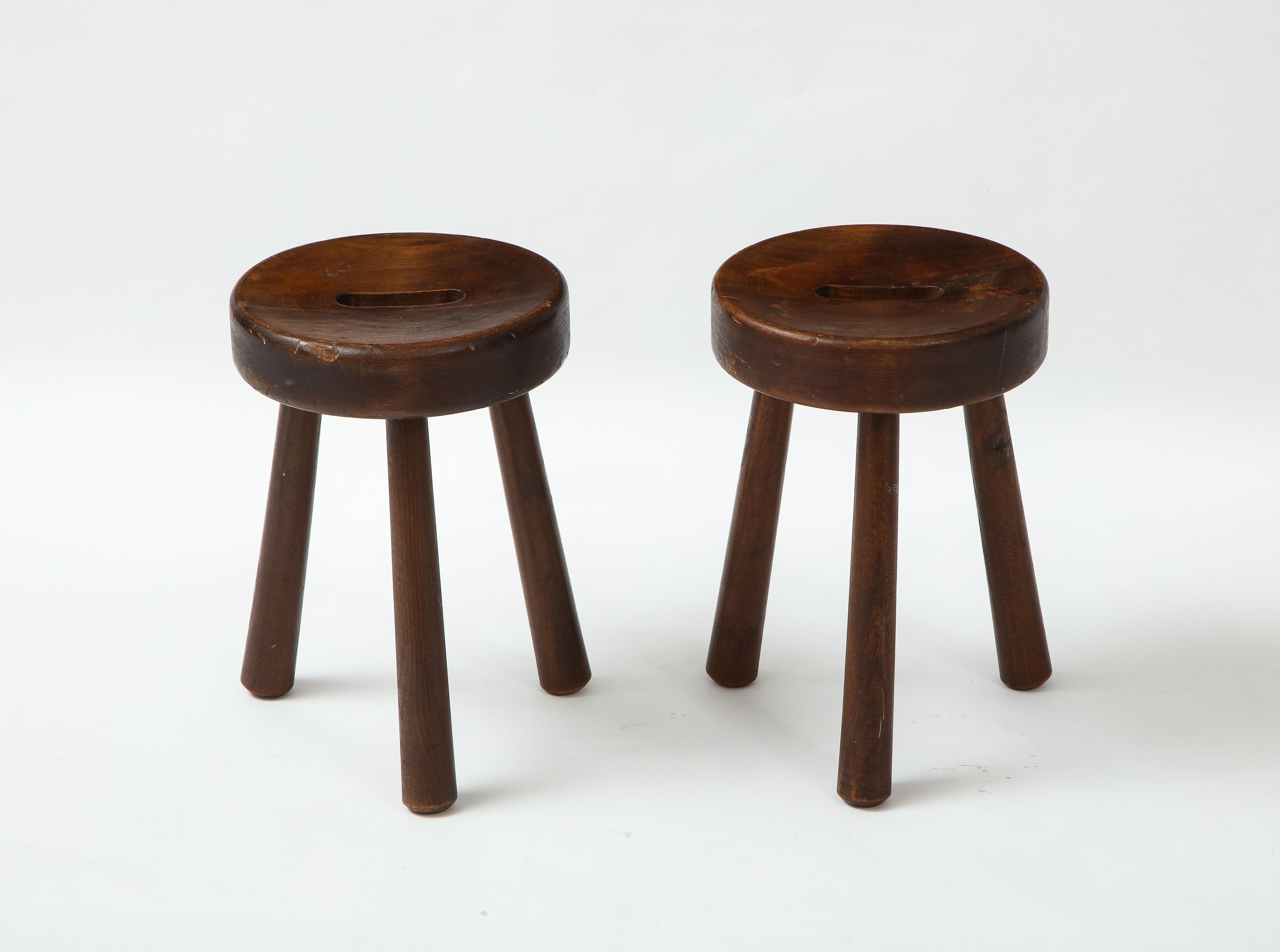 Pair of Folk Art Alpine stools, France, c. 1950 
Pine
H: 13.75 Diam. 9.25 in.