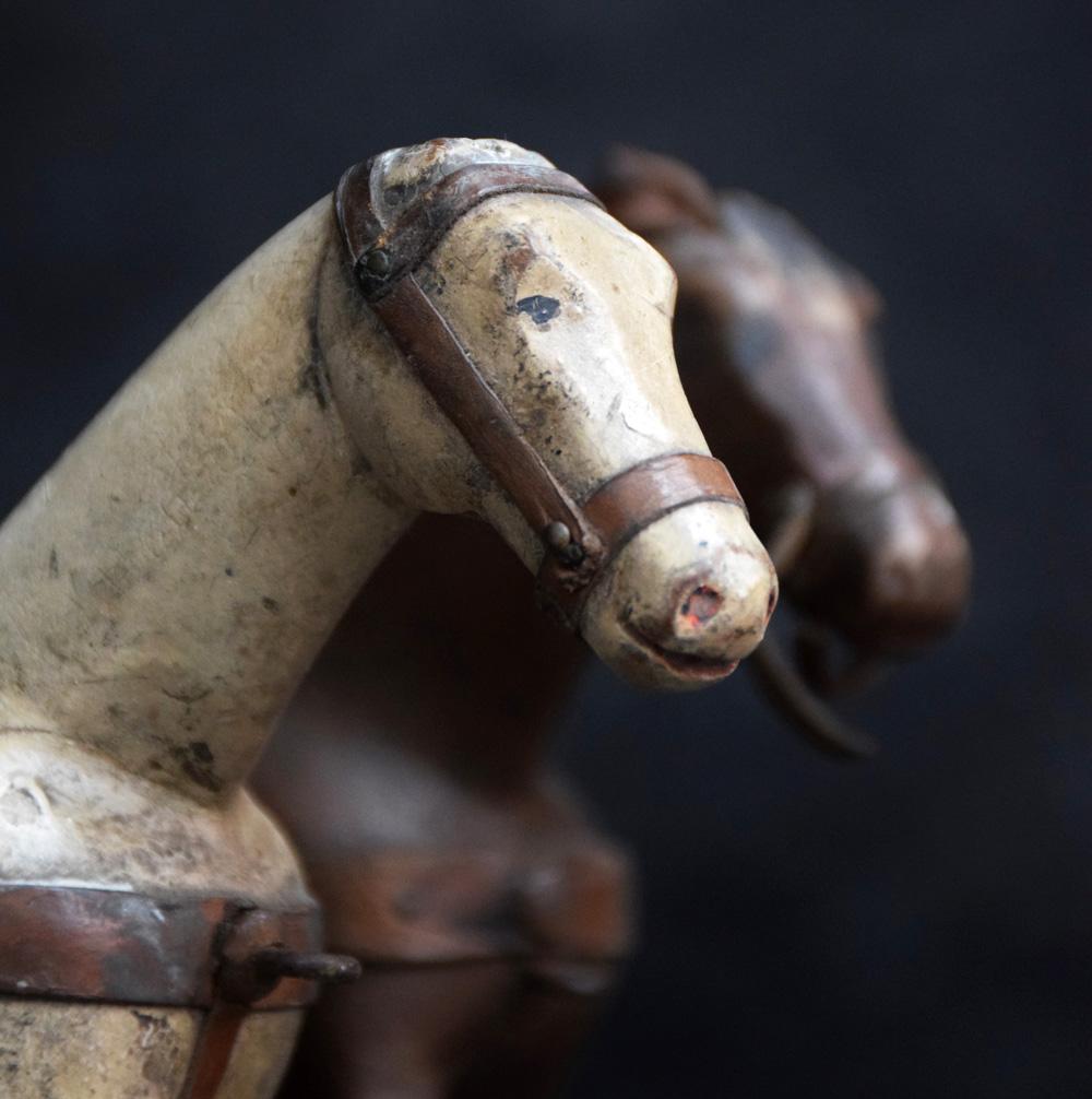 Pair of Folk Art Naïve carved wooden horse and coaches, circa 1870
We are proud to offer a rare example of a matching pair of Folk Art naïve hand carved wooden horse and carts in superb original condition. Original paint shows a wonderful aged