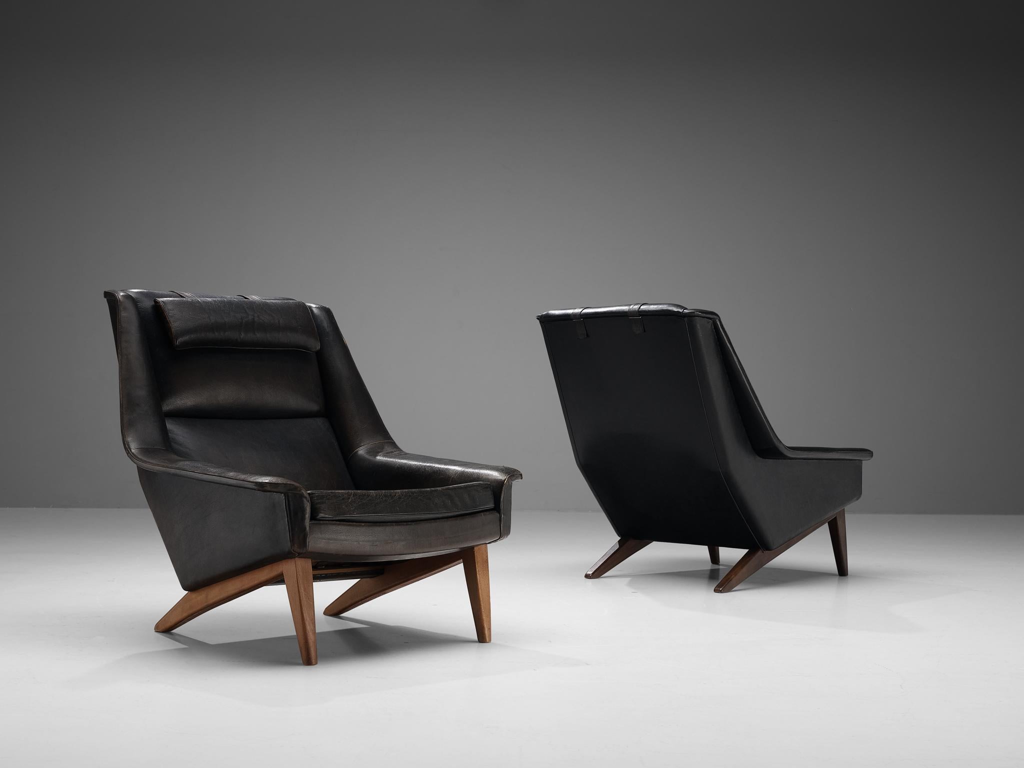 Folke Ohlsson for Fritz Hansen, pair of easy chairs, model '4410', in any preferred leather of fabric, beech, Denmark, designed in 1957

These high quality lounge chairs are characterized by a stylish timeless design based on elegant shapes and
