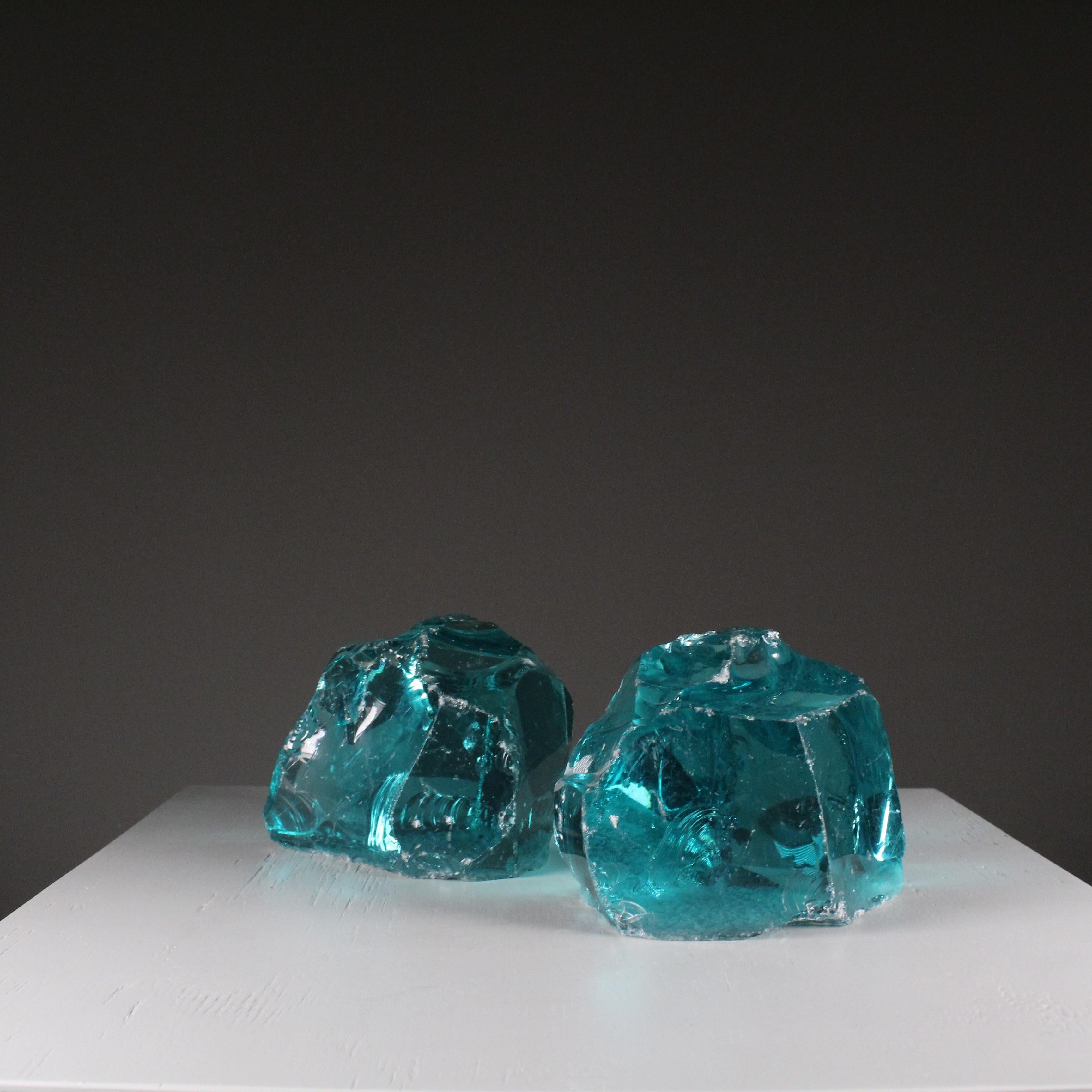 Pair of Fontana Arte glass sculptures. They are different in size and form. 

SIZE 1: 20x12x15
SIZE 2: 17x16x15