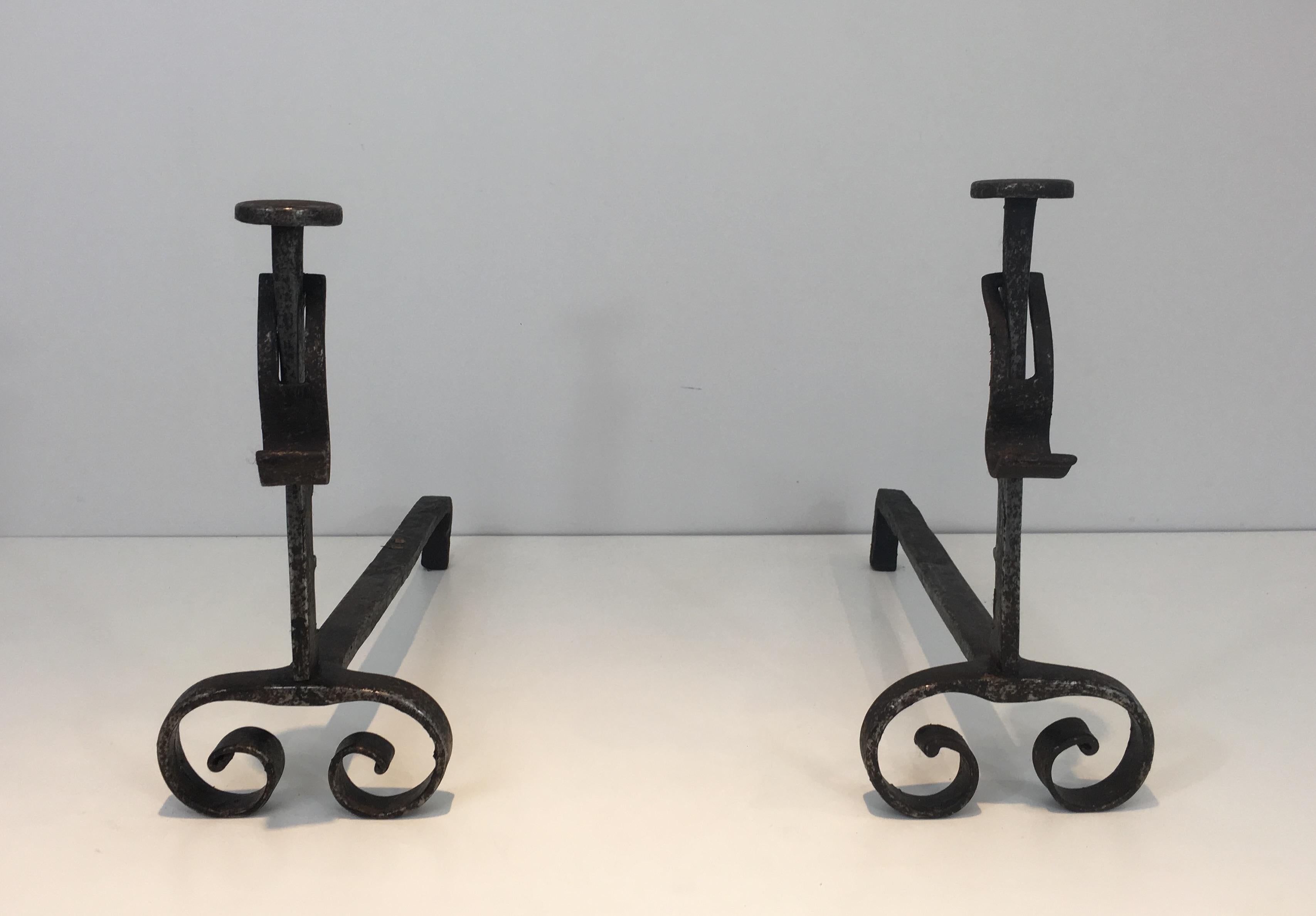 This rack and pinions andirons are made of forged wrought iron. They are French, from 19th century.