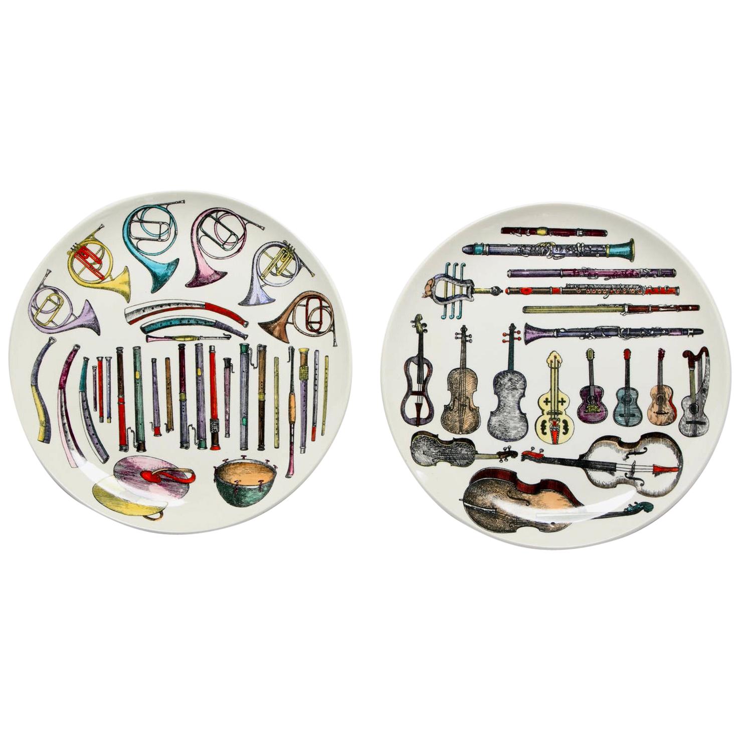 Pair of Italian Fornasetti Musical Instrument Themed Plates For Sale