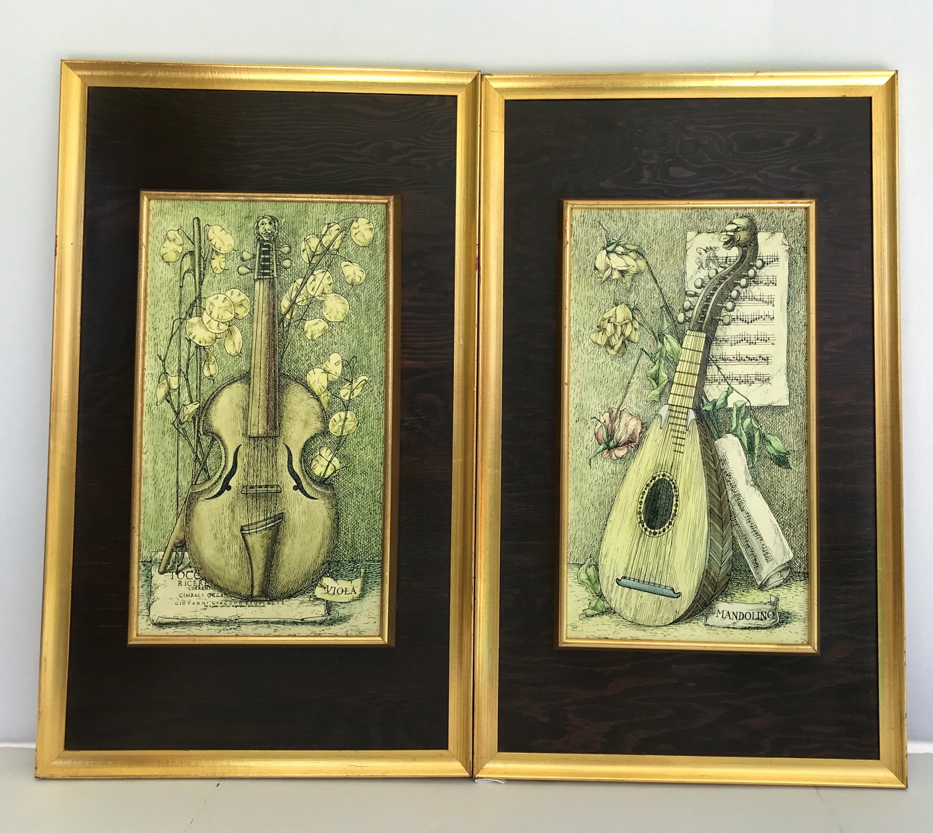 Piero Fornasetti Style Italian still life panels depicting string instruments, a viola and a mandolin(o).  Made by Felice Galbiati Arte Decorativa in Milan.  A lacquered lithographic transfer on wood, framed and centered on a larger framed dark wood