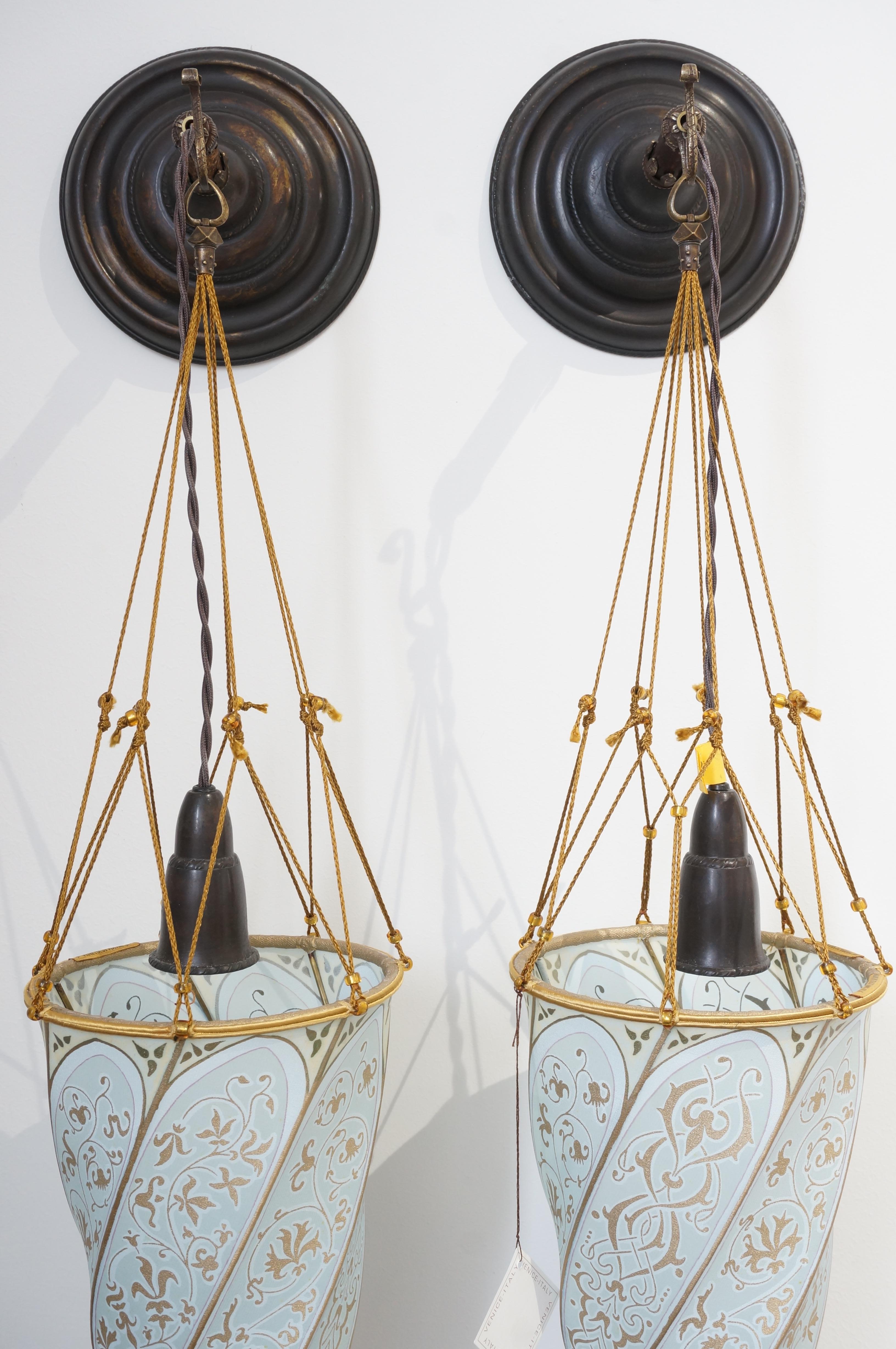 This styiish and chic pair of Forturny silk wall scones will make a subtle statement with their use of materials and form. 

Note: The pieces are new old stock that has never been previously installed.

Note: Each scones requires one candleabra