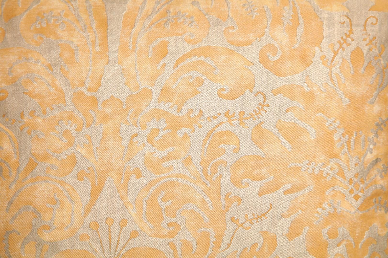 A pair of Fortuny fabric cushions in the Lucrezia pattern yellow and silvery gold colorway, silk blend backing material and silk bias edging. The pattern, a 17th century Italian design named for Rembrandt's painting.
50 down/50 feather insert.
Newly