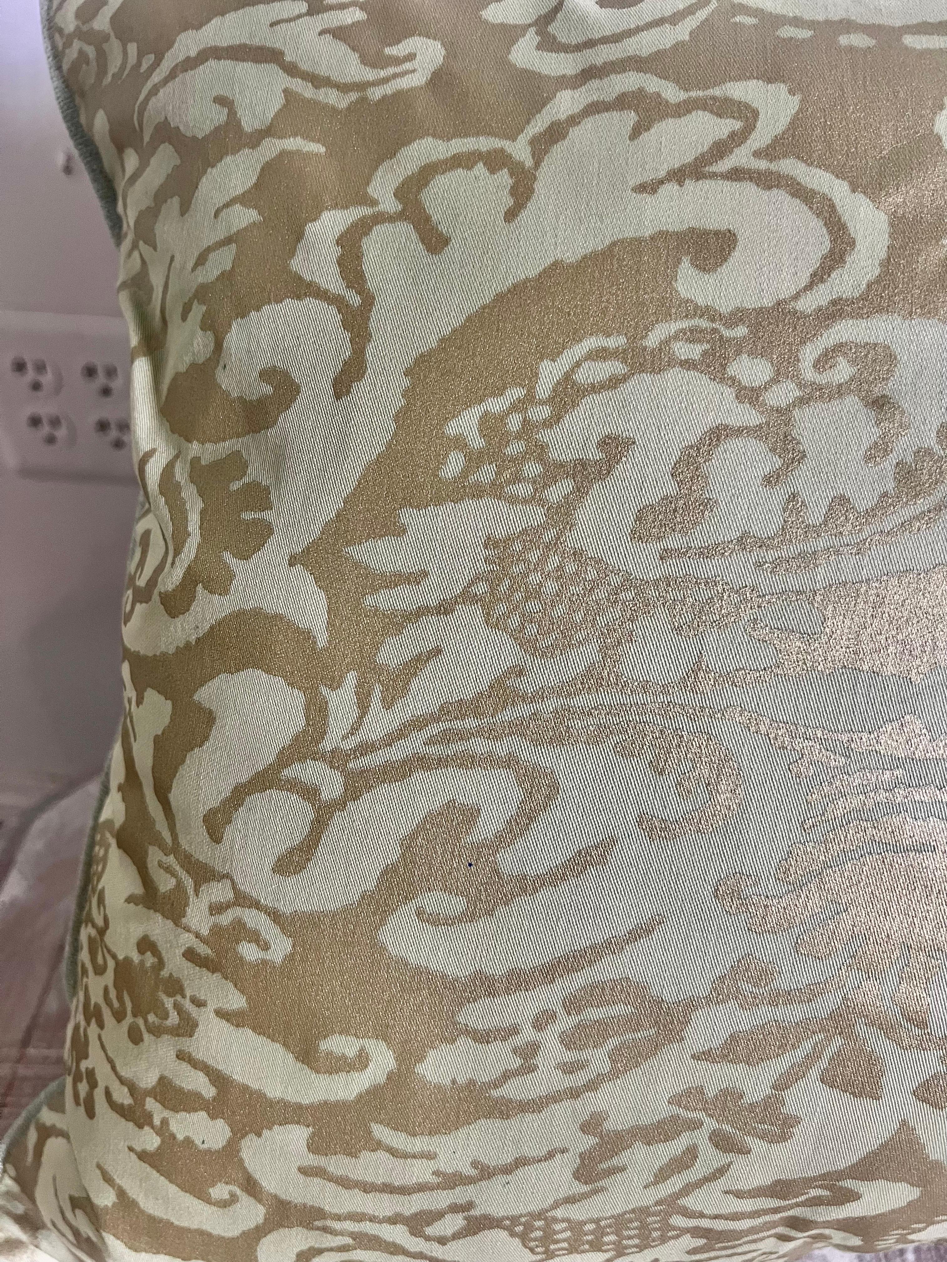 Pair of custom pillows made with metallic gold & celadon colored Fortuny style fronts and celadon silk backs.  Down filled inserts w/ hidden zippers for easy cleaning.