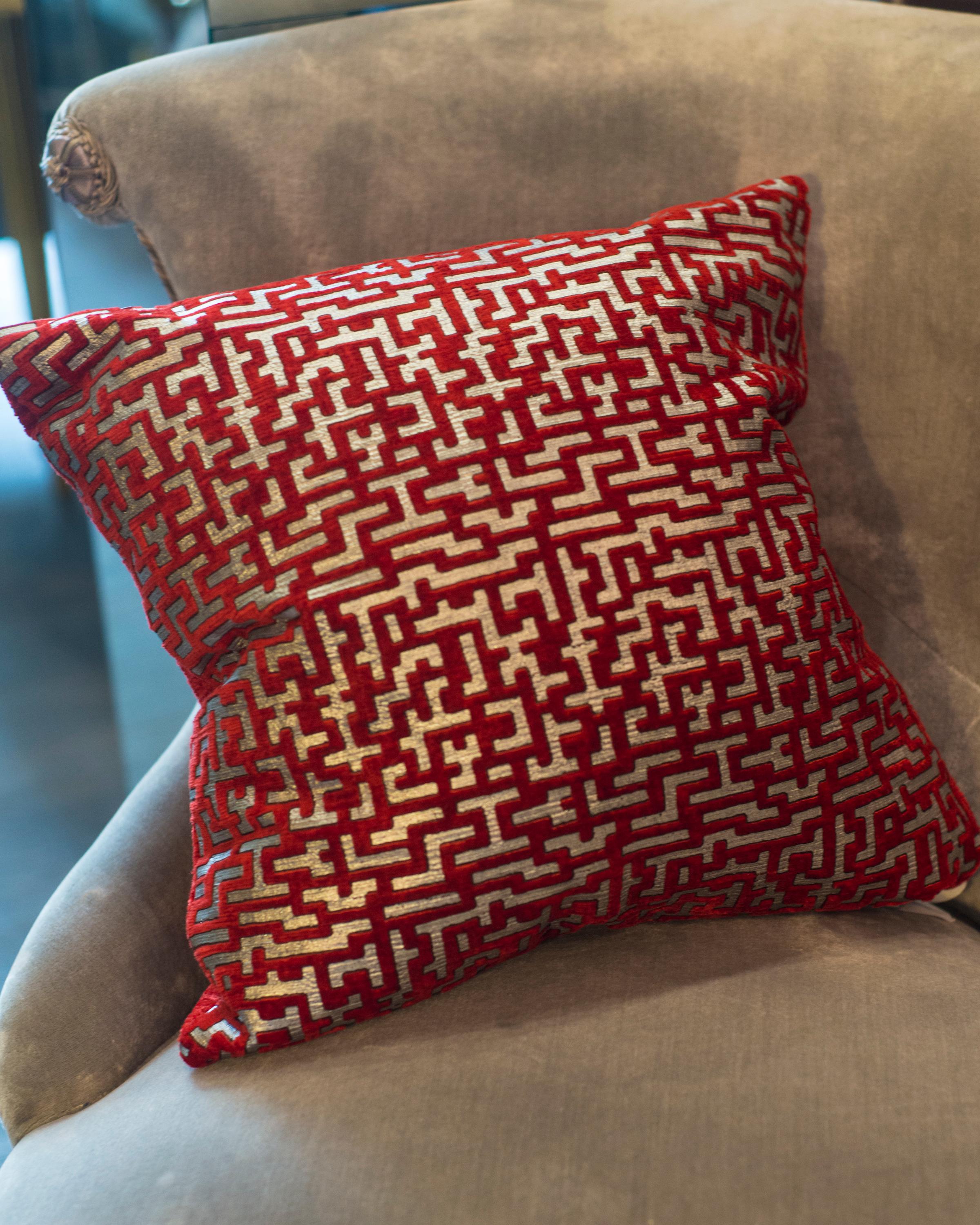 red and silver throw pillows