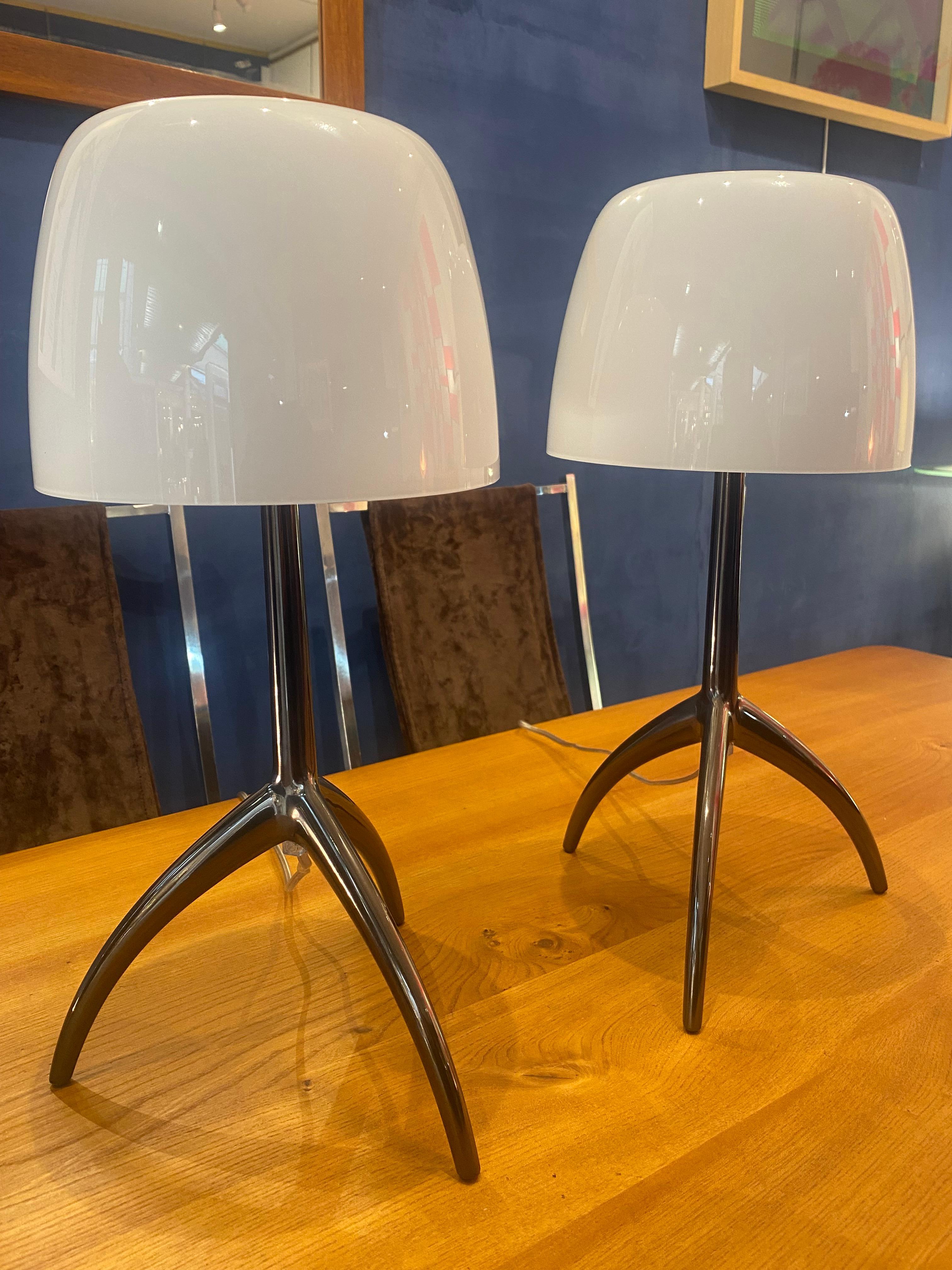 Pair of Foscarini “Lumière” model lamps
White blown glass and aluminum legs structure
H 45 x 26 in diameter
New
In perfect condition