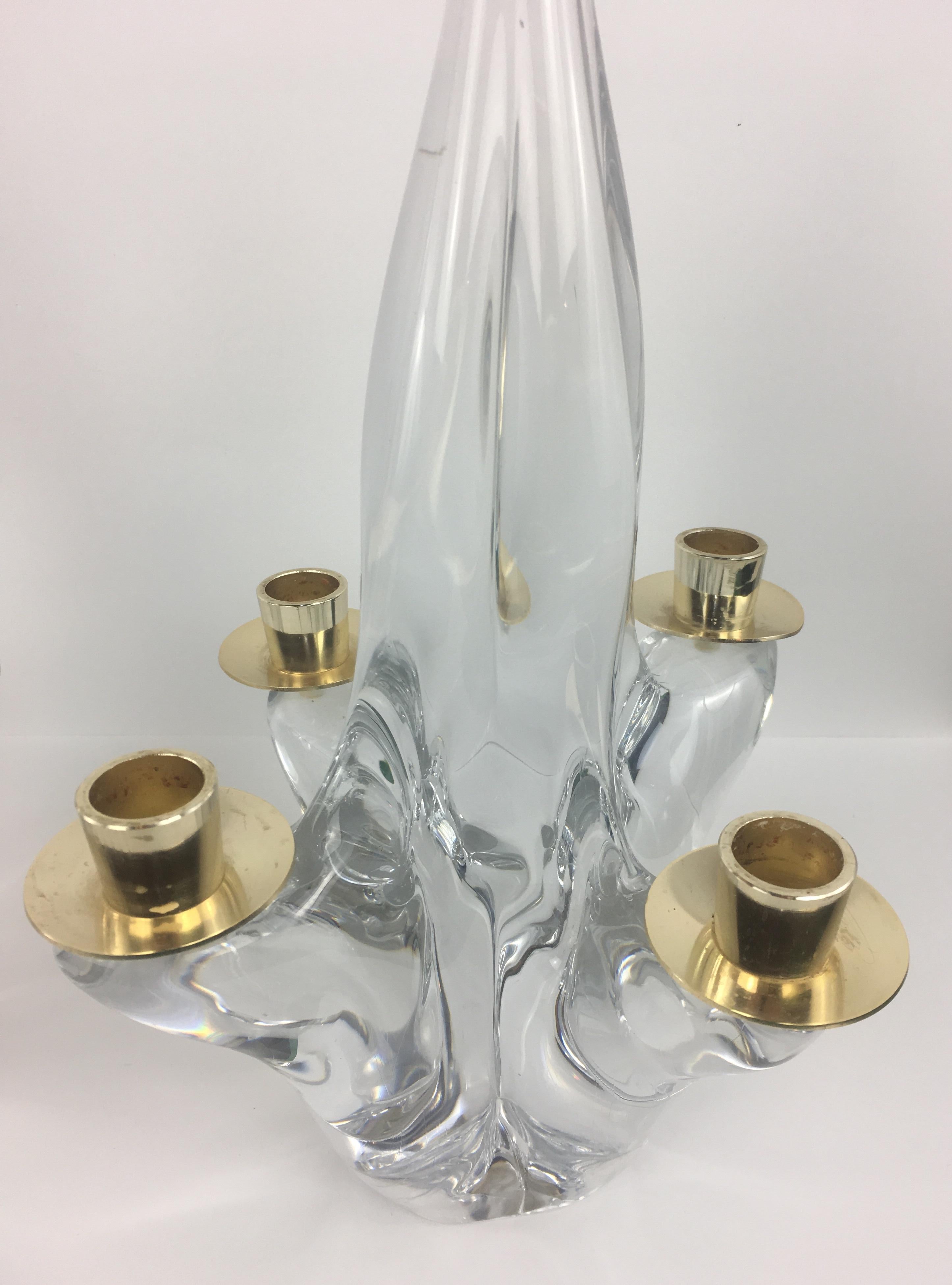 Pair of mid-century sculptural four arm crystal candle holders by Schneider, France. These modern candle holders are absolutely beautiful and in very good condition.  Unique and interesting typical of various innovative designs created by Schneider.