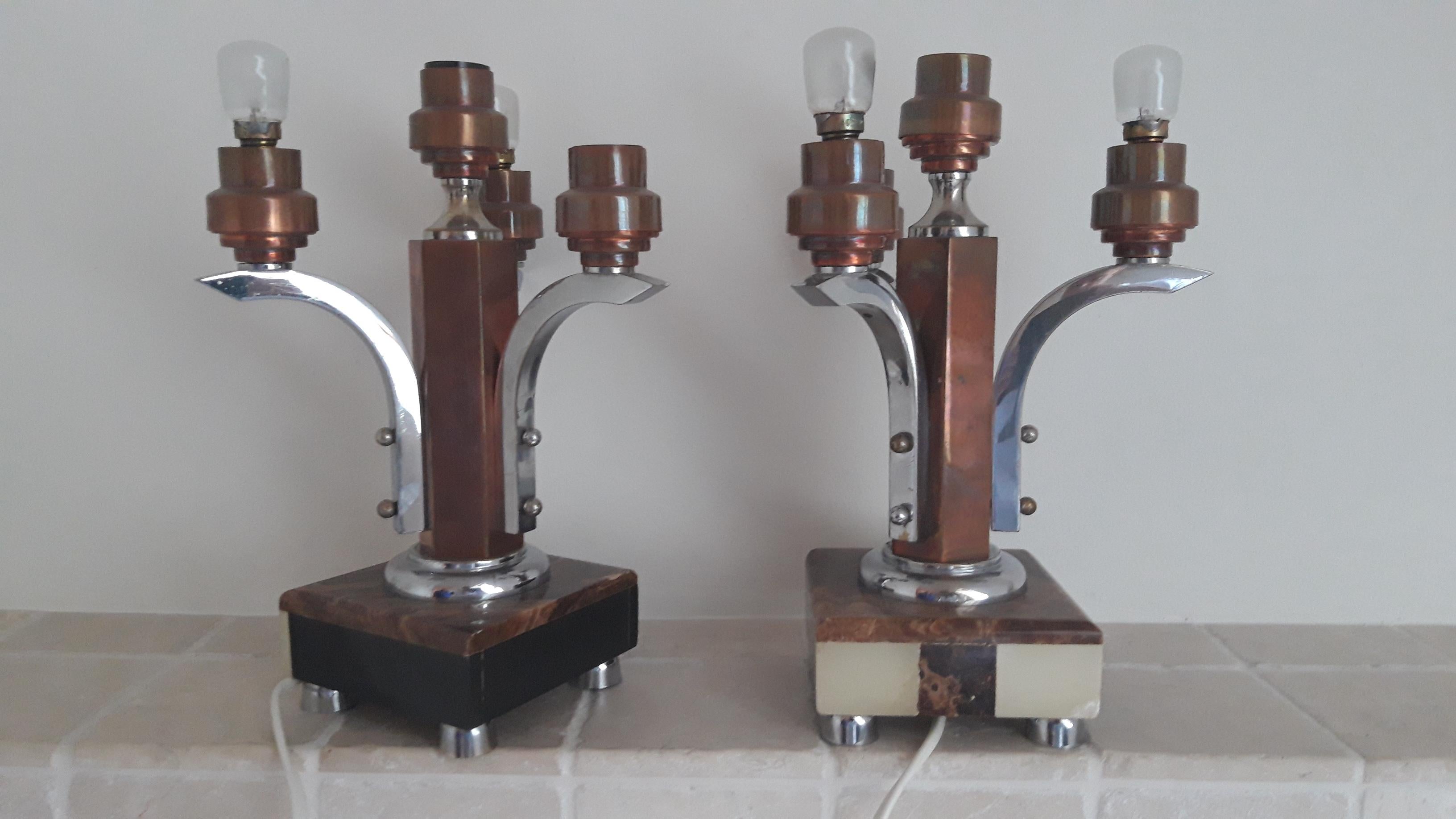 Pair of four-light Art Deco copper table lamps.
France, circa 1930.