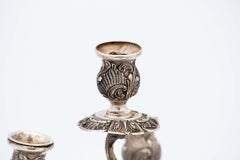 Pair of four-light silver candlesticks