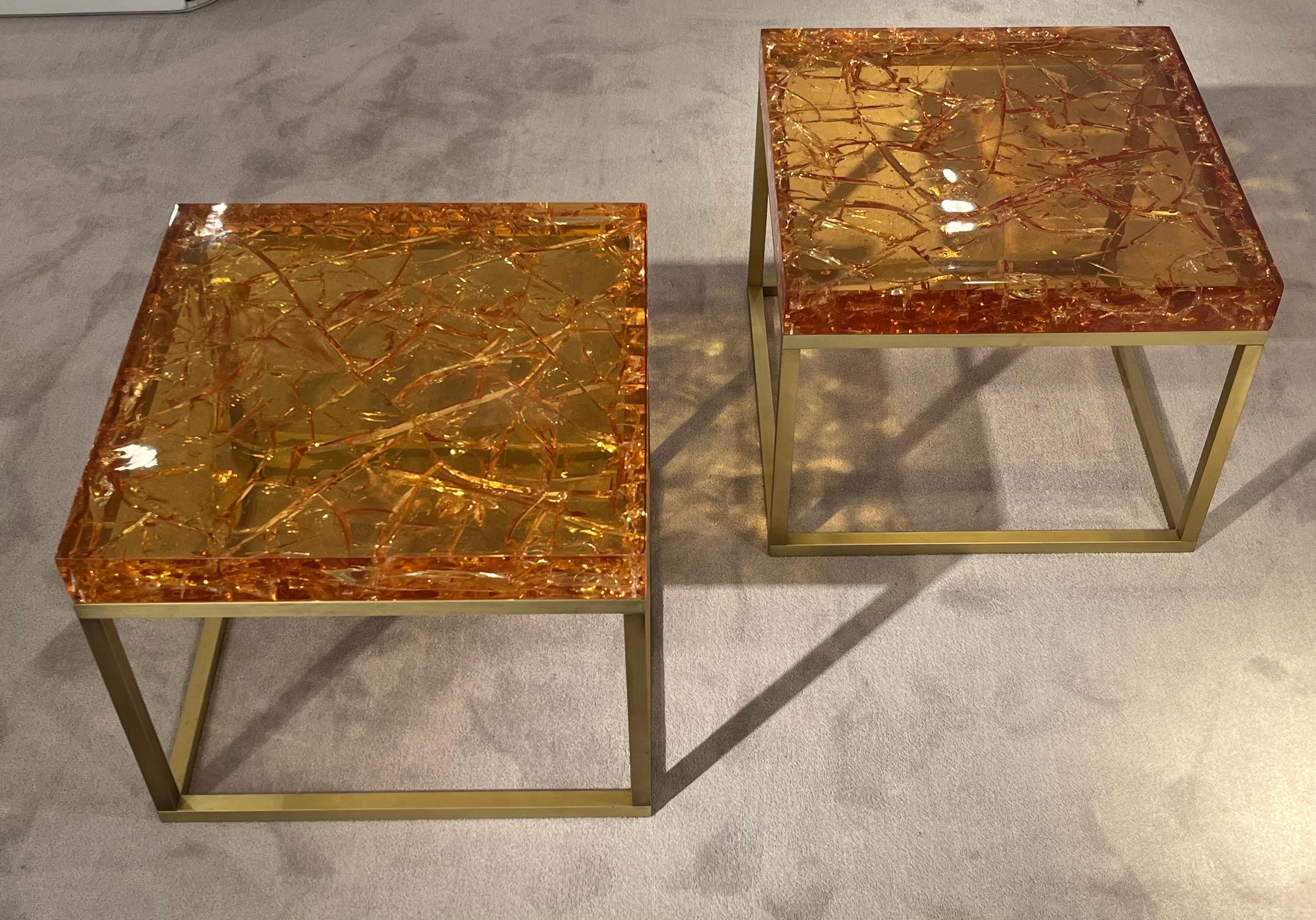 Pair of amber color fractal resin tables
mounted on brass feet
Perfect condition