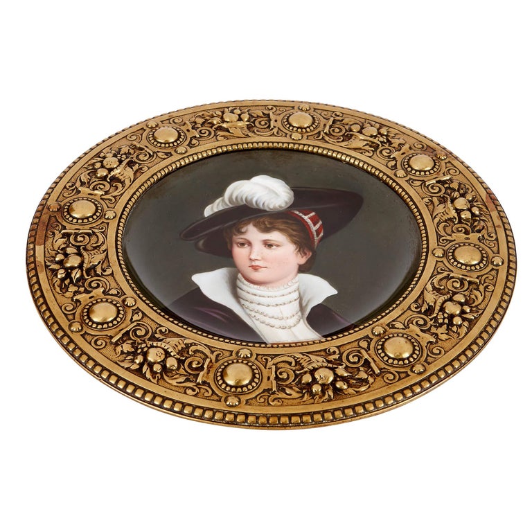 Pair of framed antique circular porcelain portrait plaques For Sale at