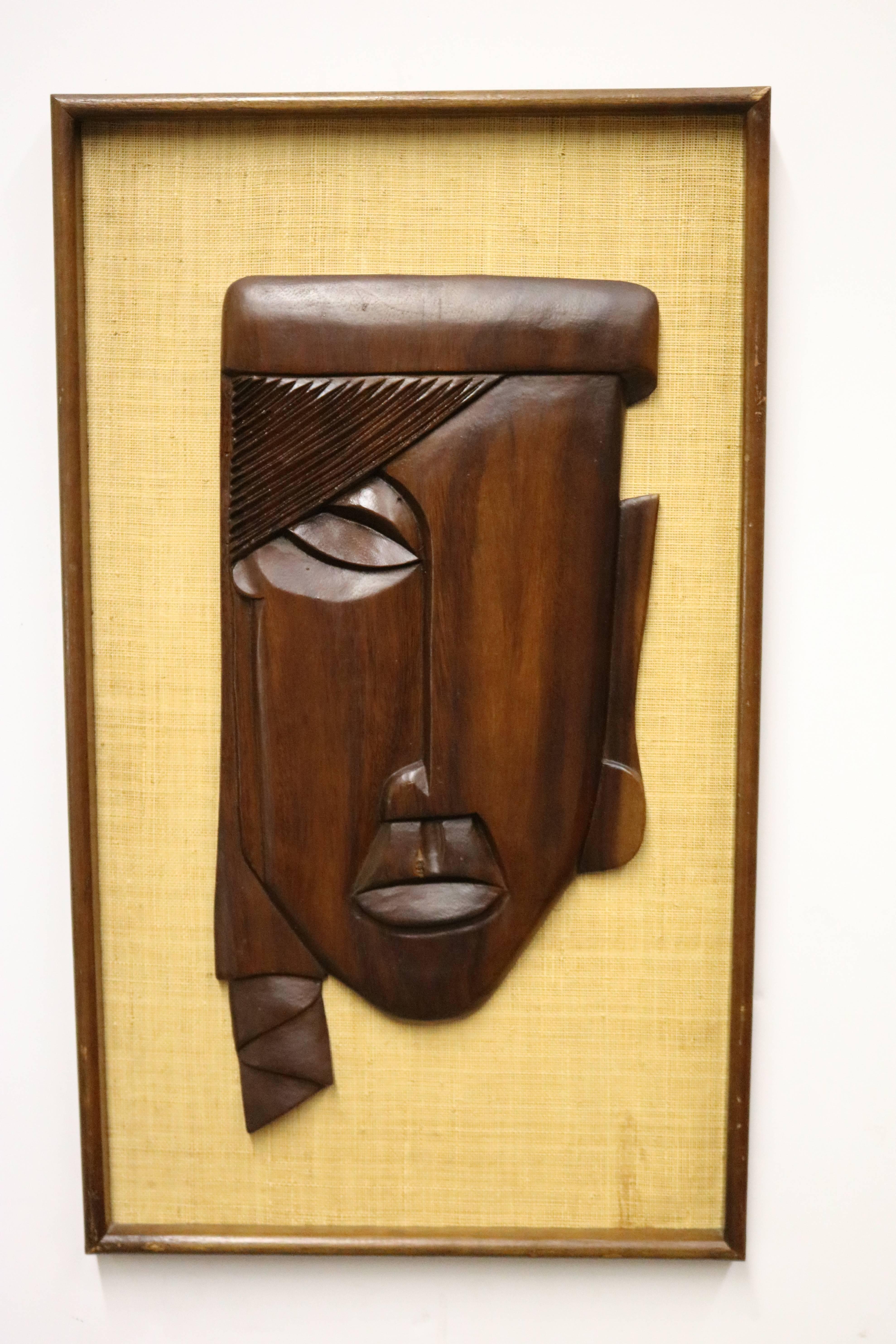 Mid-Century Modern Pair of Framed Carved Brown Rosewood African Faces