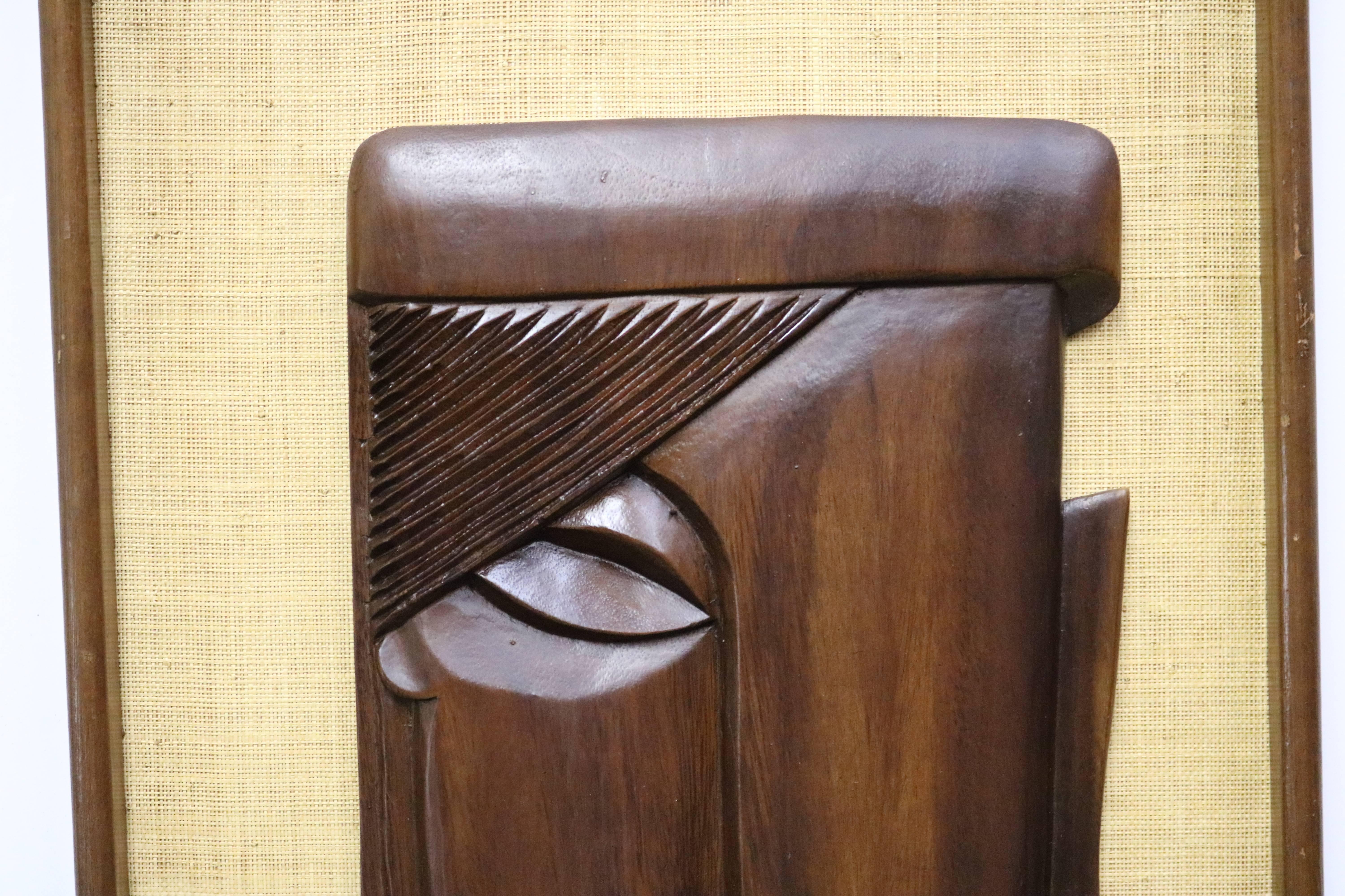 Pair of Framed Carved Brown Rosewood African Faces In Excellent Condition In Pasadena, CA