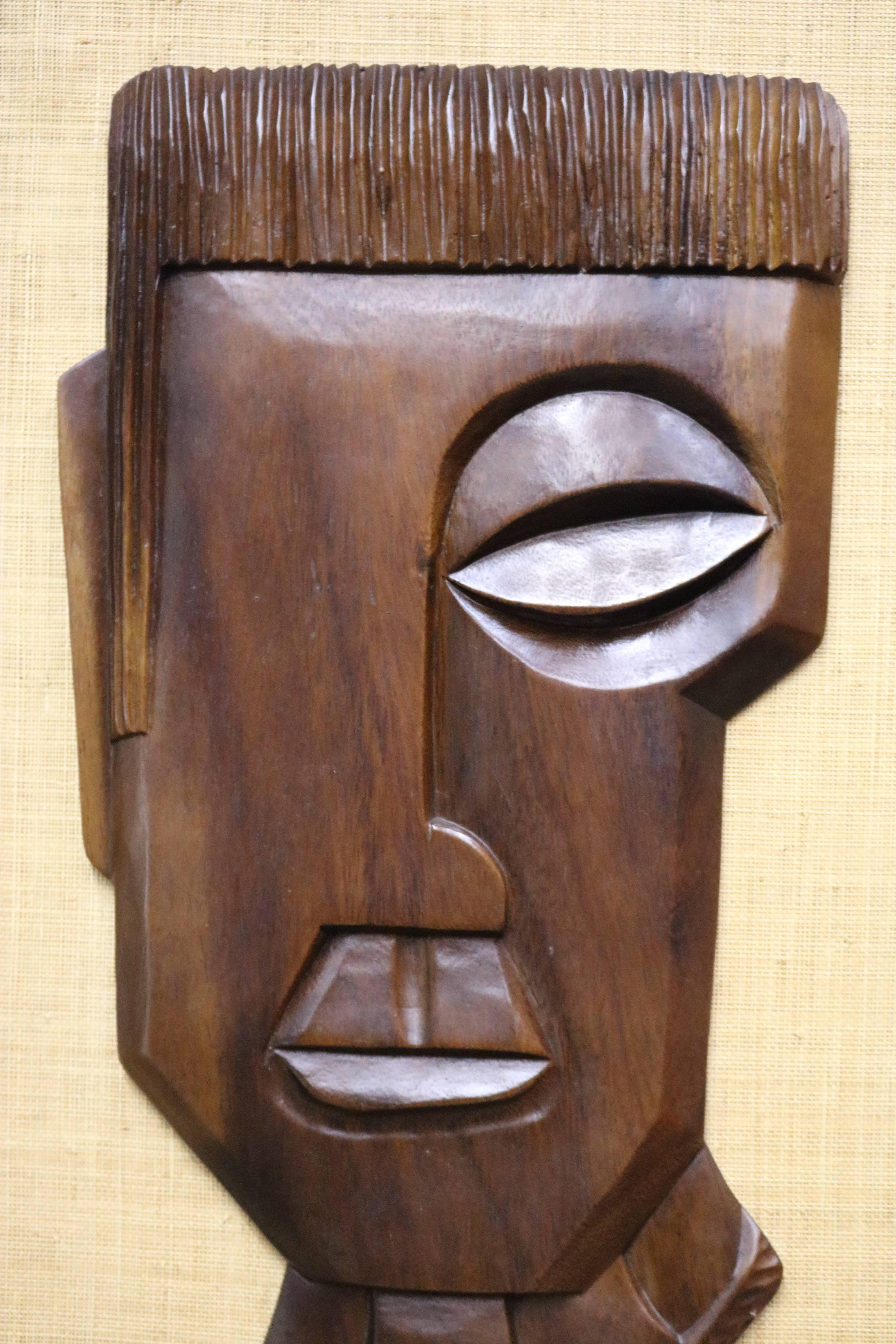 Pair of Framed Carved Brown Rosewood African Faces 1