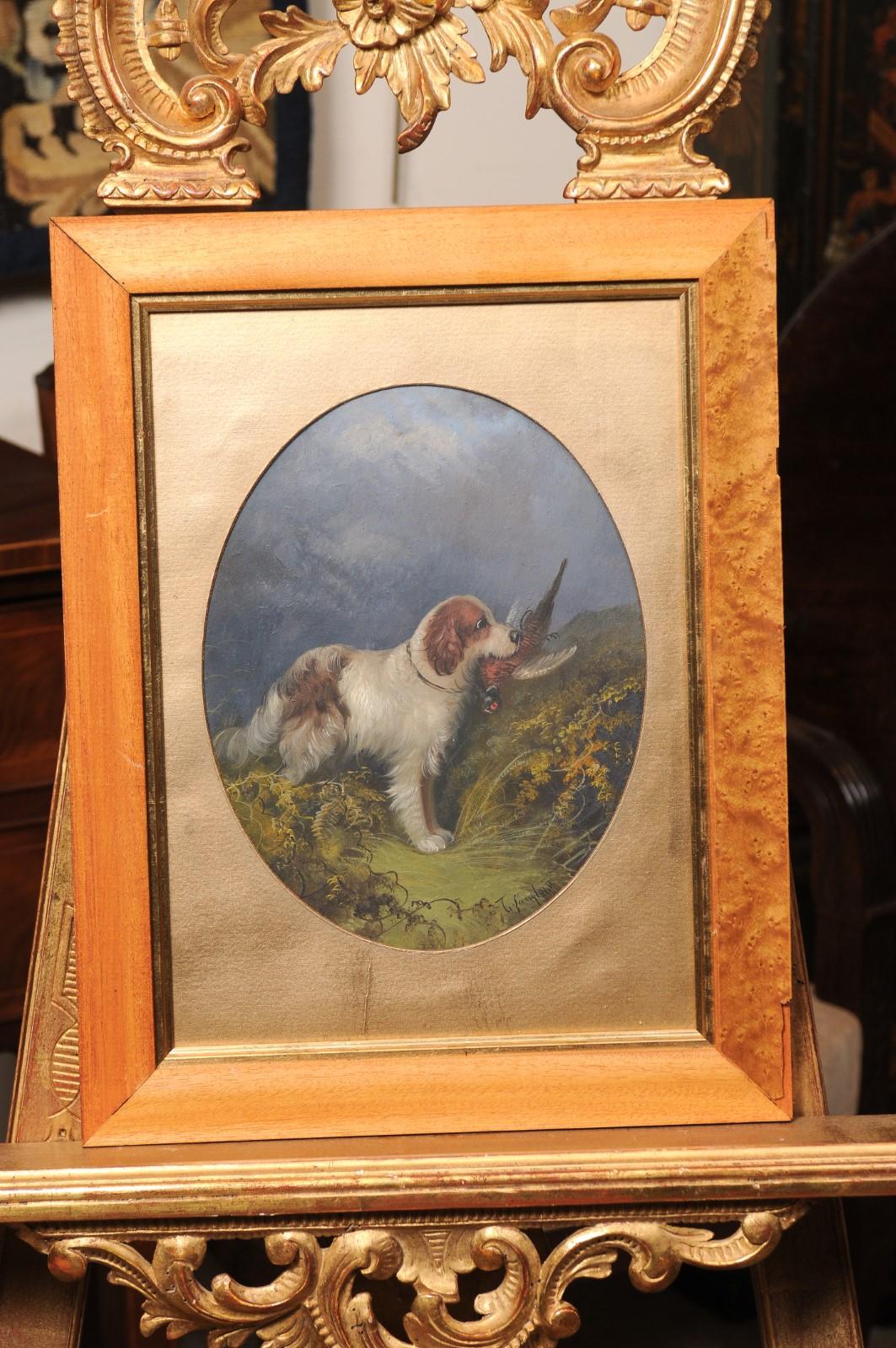 Coppia di dipinti a olio su tavola di cani del XIX secolo inglese incorniciati con vetro
