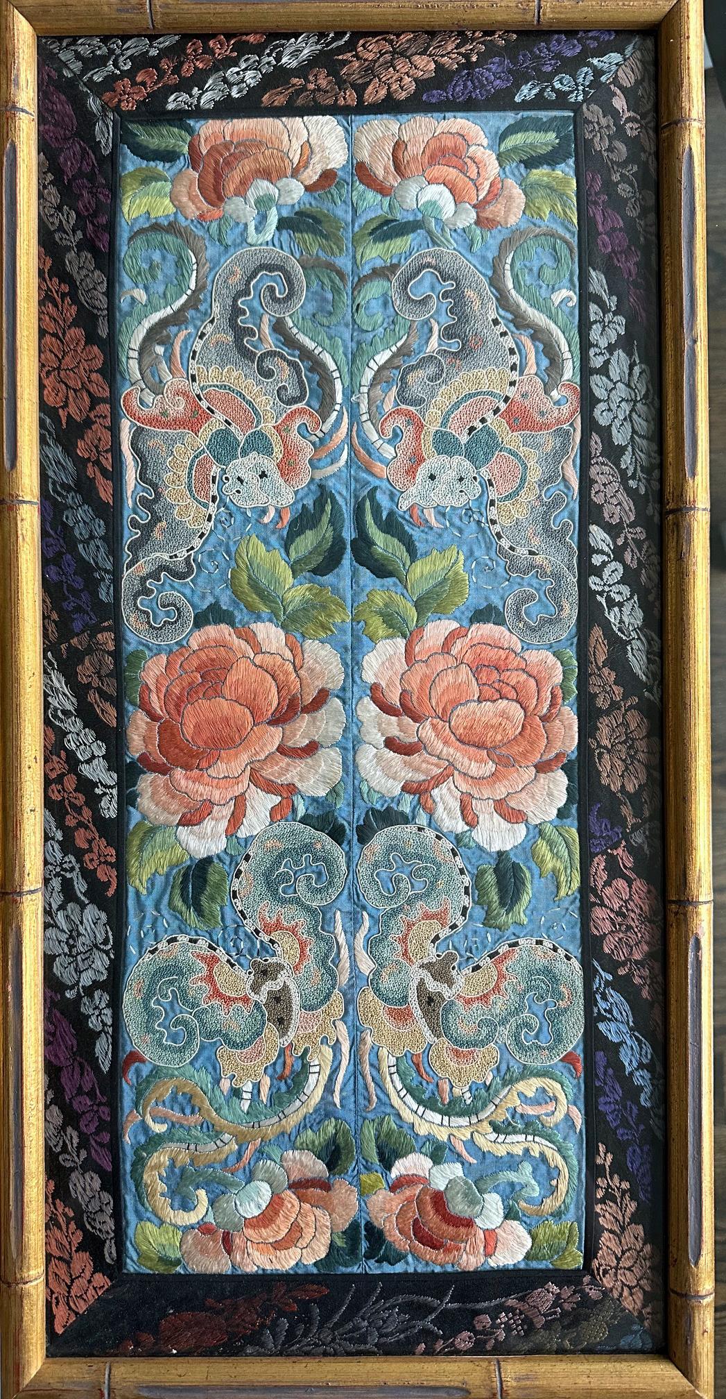 A pair of framed antique Chinese embroidery textile panels circa 19th century of Qing Dynasty. Each piece features two mirror-matching panels (likely designated to be the sleeves), finely embroidered with colored threads and mounted in embroidered