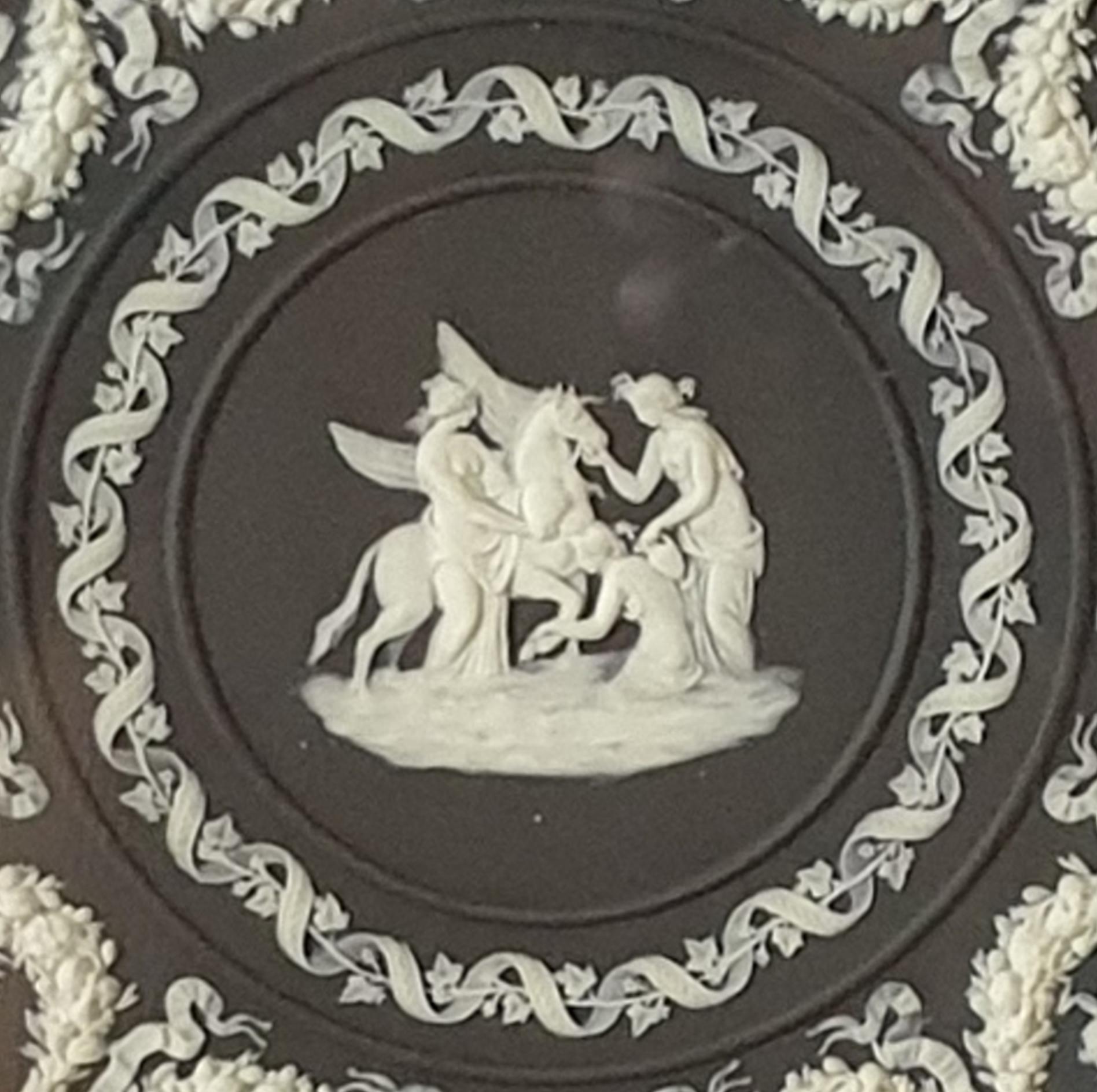 Molded Pair of Framed Trophy Plates in Black Jasperware, Wedgwood, circa 1880