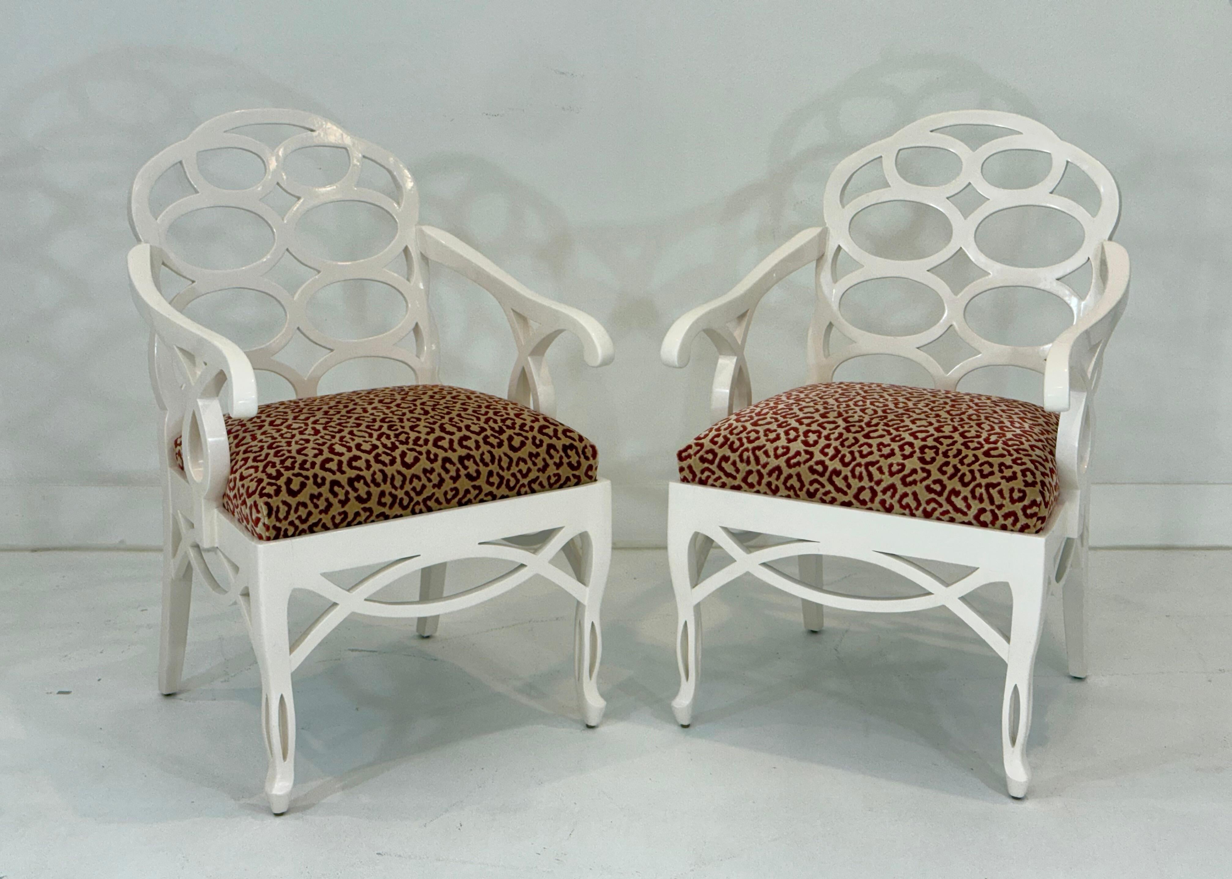 This pair of Loop Chairs faithfully channels the iconic design of Francis Elkins, one of the most influential American decorators of the 20th century. Most likely made in Italy in the 1980s-90s, these chairs feature the signature interlocking oval
