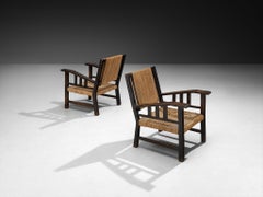 Pair of Francis Jourdain Lounge Chairs in Woven Rush and Wood