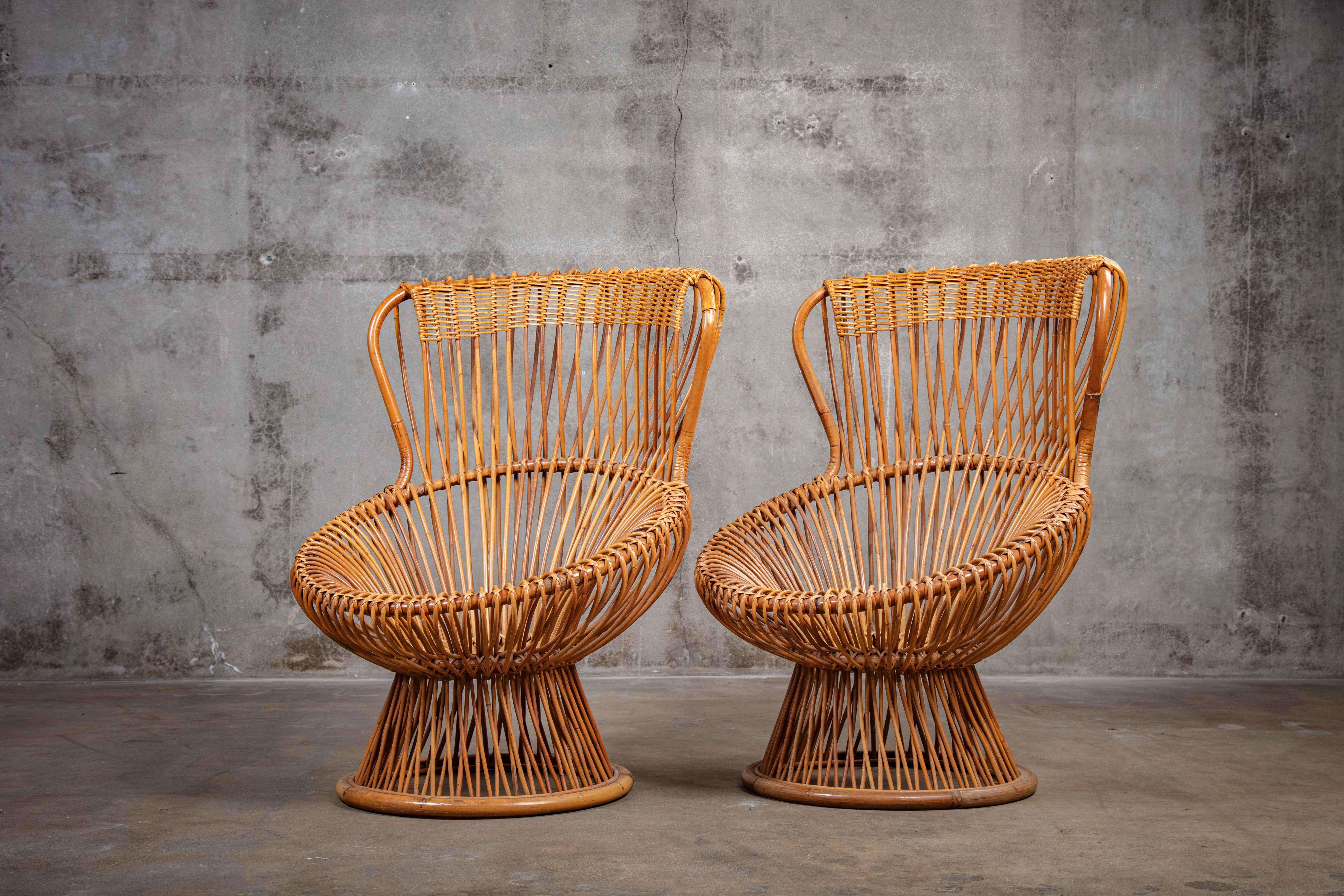 Pair of Franco Albini 'Margherita' cane chairs, 1960s.

Measure: Seat 16