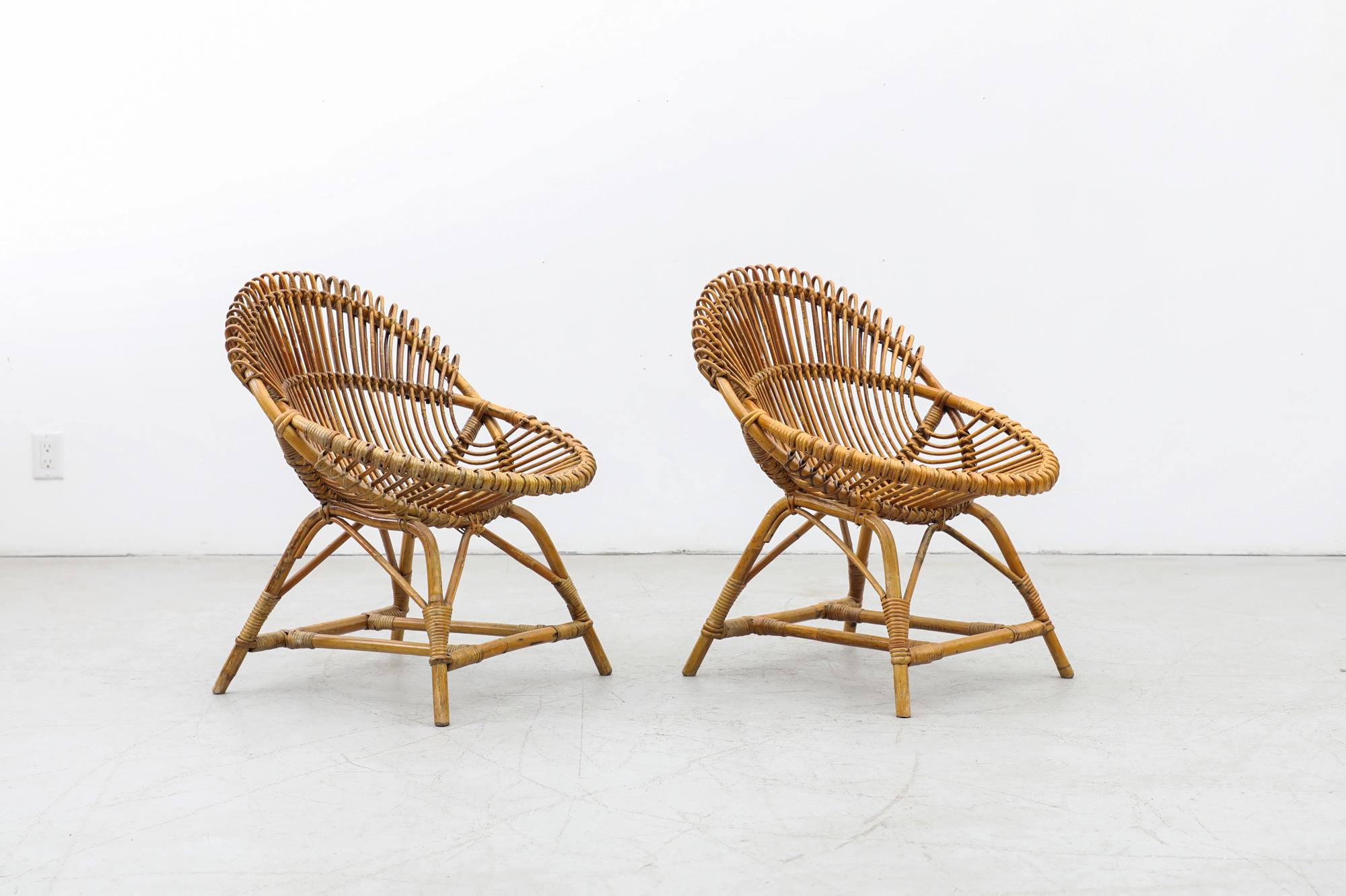 Gorgeous Mid-Century Bamboo Franco Albini Style Lounge Chairs. In Original Condition with Some Signs of Wear Consistent with Age and Use. Other Matching Hoop Lounge Chairs available and listed separately. These chairs can be used outdoors under a