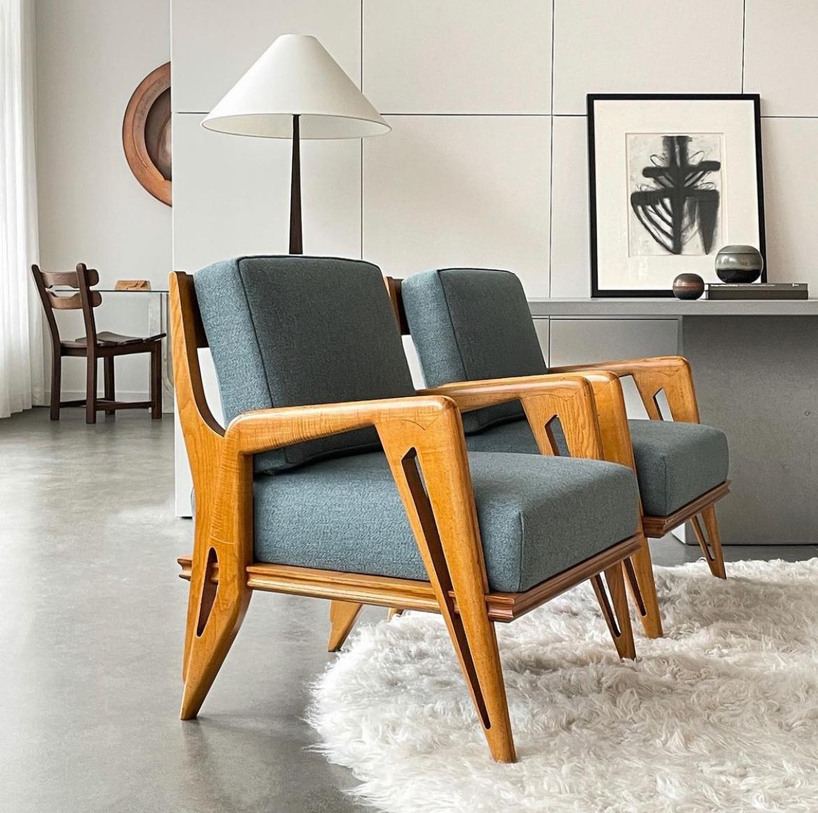 A pair of stunning Italian lounge chairs, by the renowned designers Franco Campo and Carlo Graffi (1925-1985), two of Italy's most celebrated furniture designers from the mid-20th century. These exquisite lounge chairs, dating back to the 1950s, are