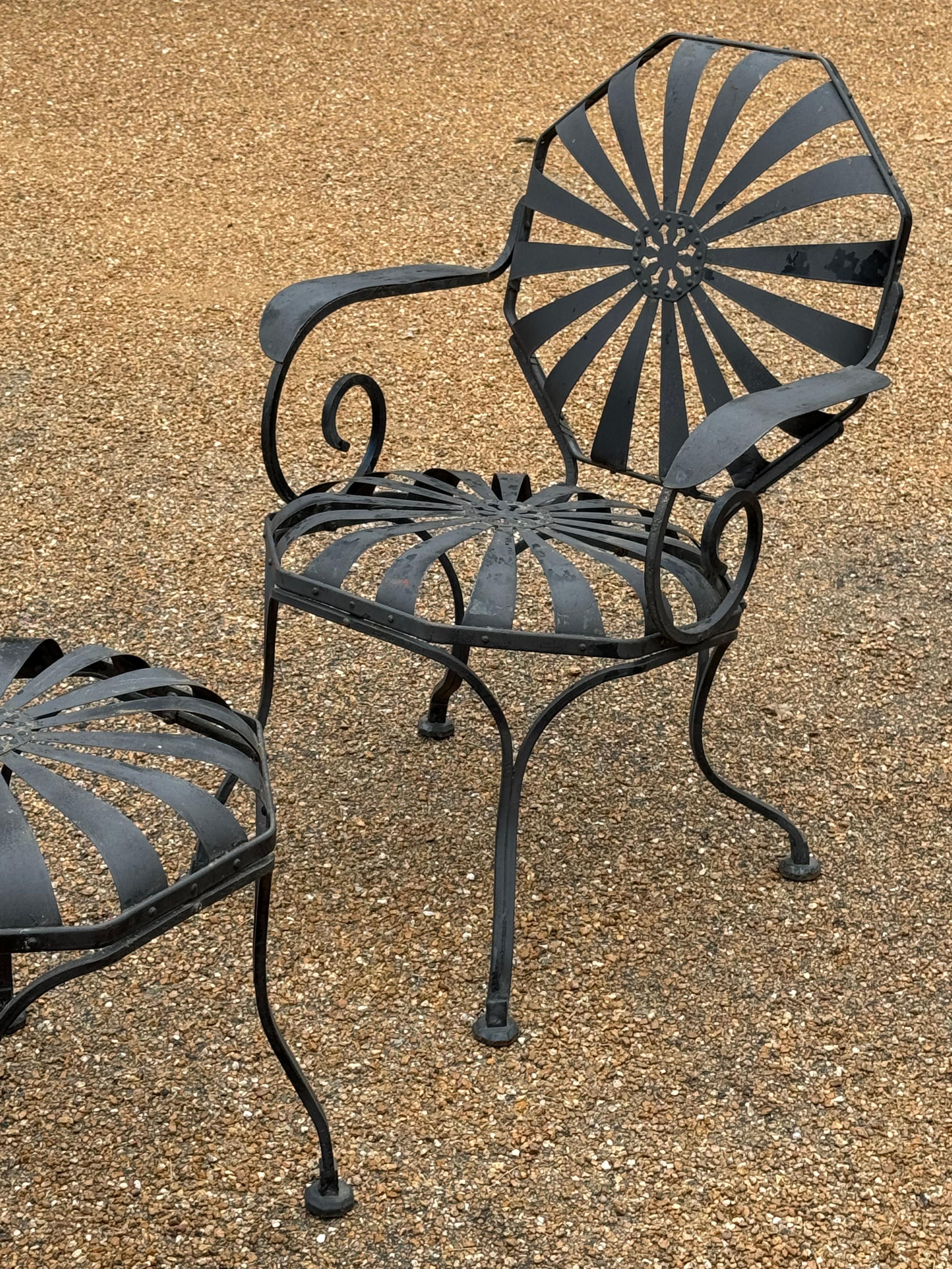 Mid-20th Century Pair of Francois Carre Black Pinwheel or Sunburst Garden Arm Chairs with Ottoman