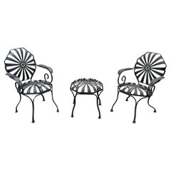 Pair of Francois Carre Black Pinwheel or Sunburst Garden Arm Chairs with Ottoman