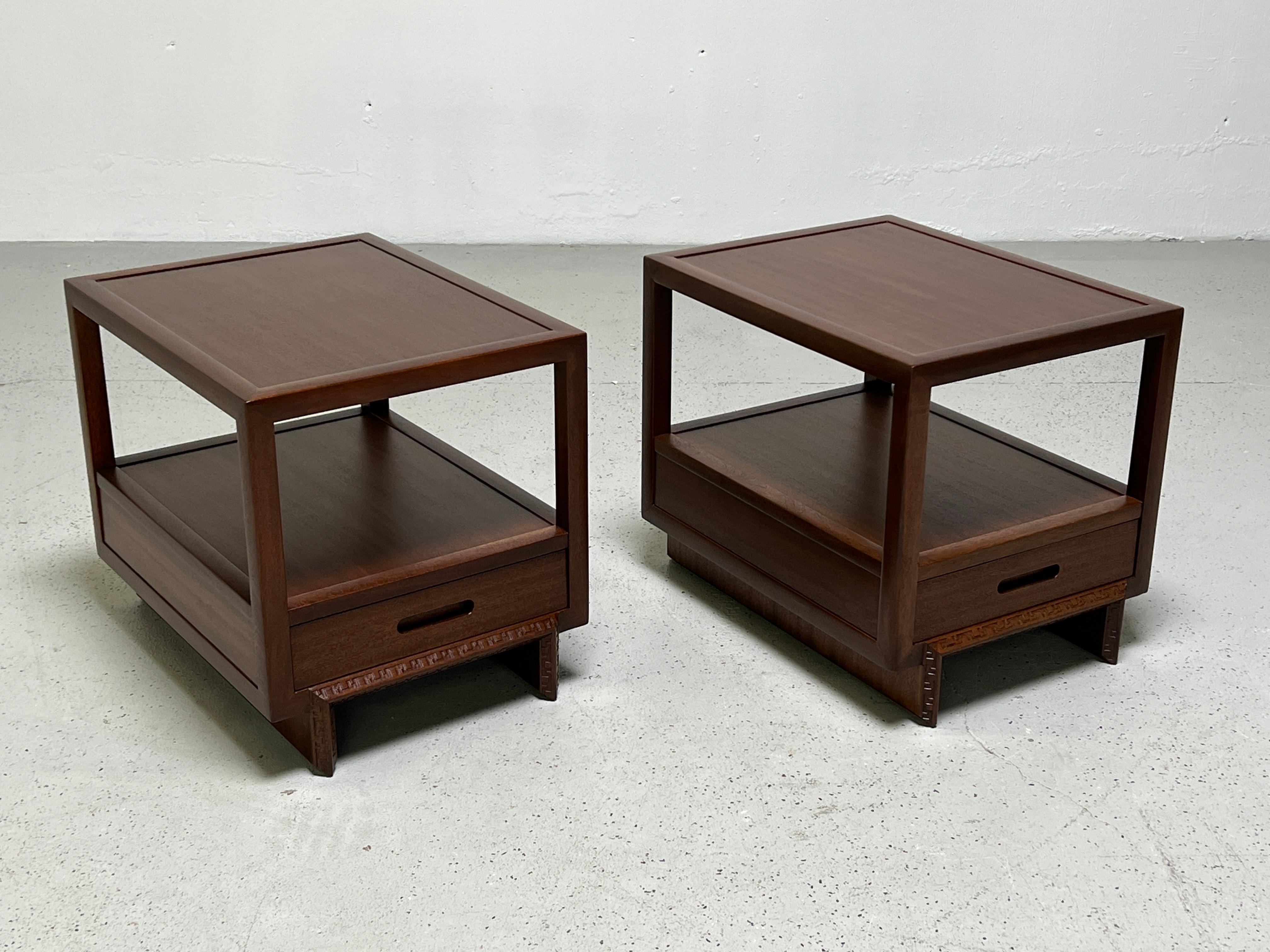 A pair of mahogany 'Taliesin' nightstands by Frank Lloyd Wright for Henredon.