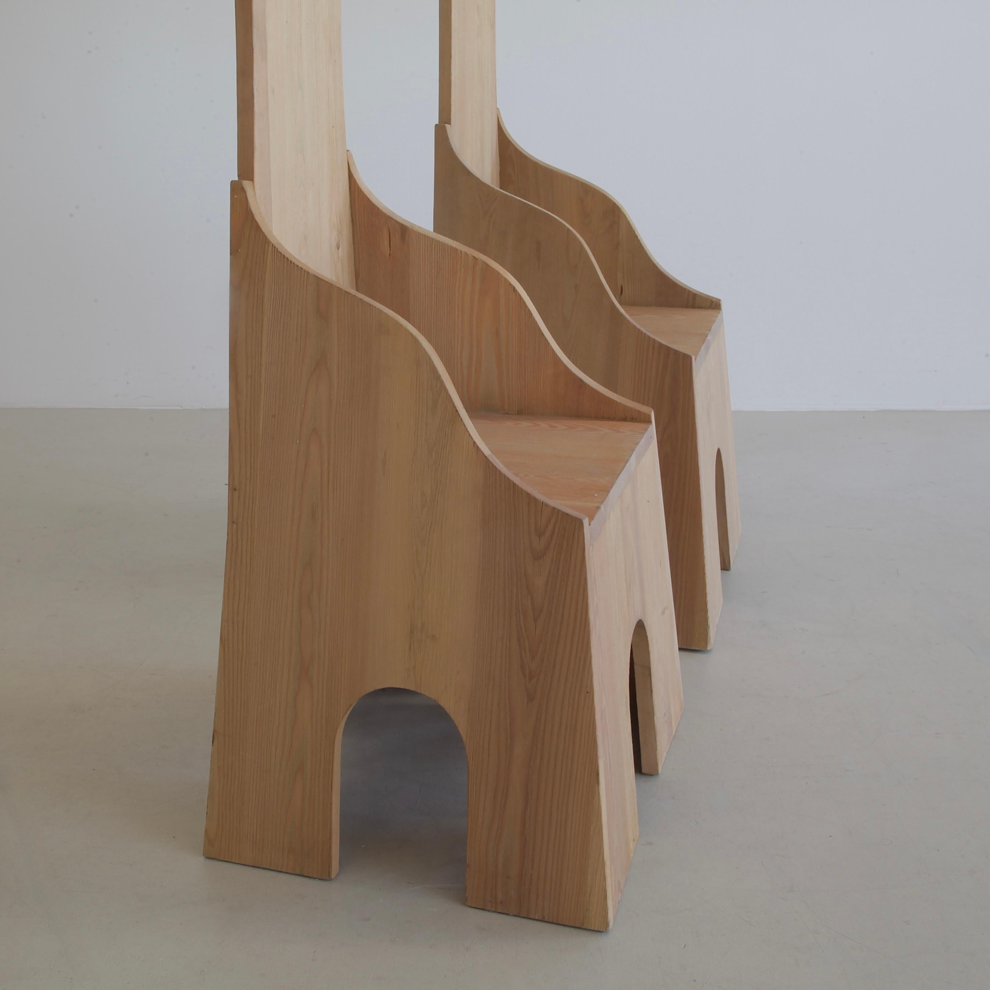A pair of Totem Chairs designed by Mario Ceroli. Italy, Poltronova, 1972.

Two 'FRATINA' chairs by Mario Ceroli, produced by Mobili Nella Valle for Poltronova. Unrefined Russian pine, stamped on the side of the chairs 'Ceroli - Poltronova'. ARTE