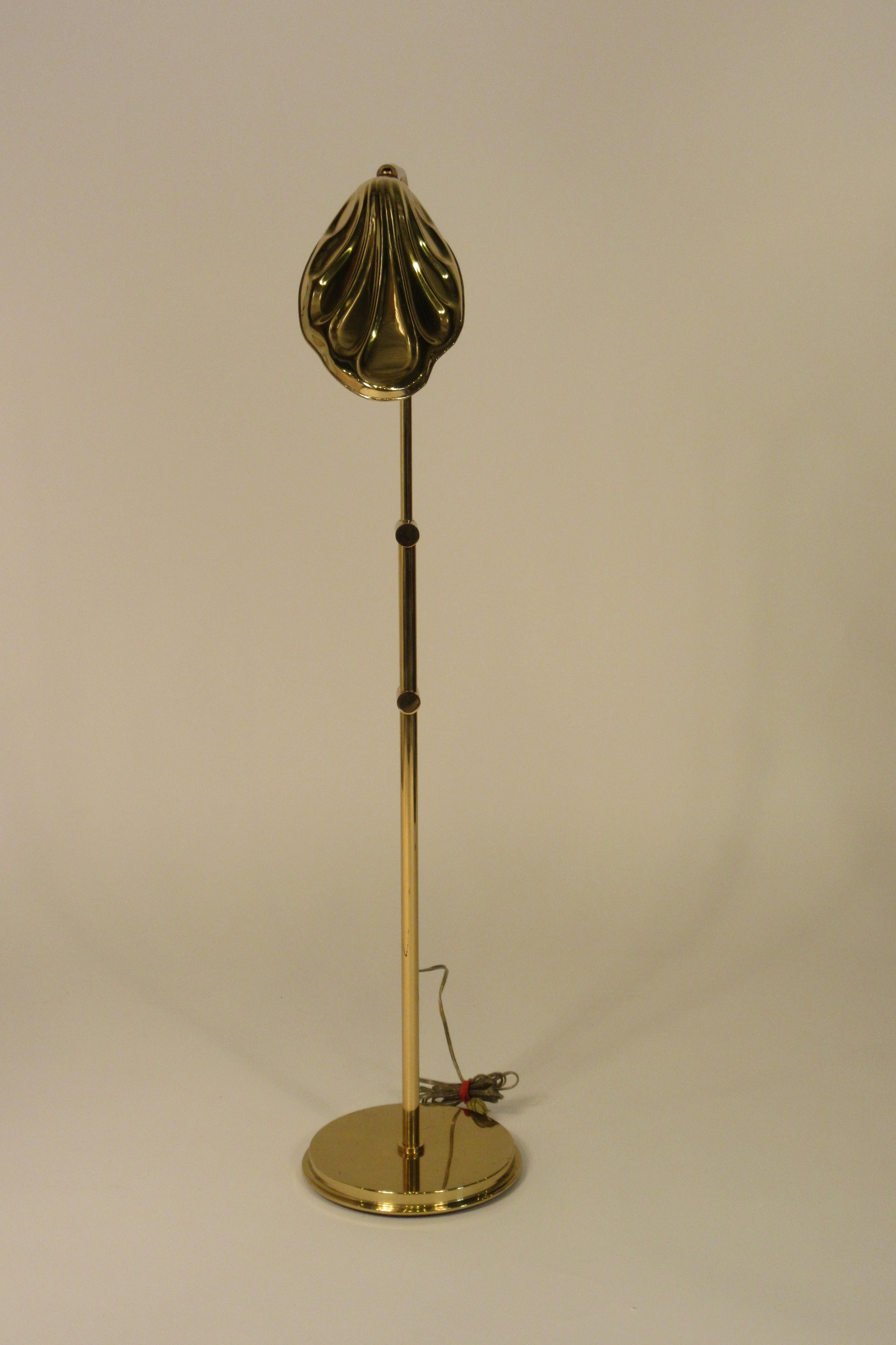 Pair of Frederick Cooper adjustable brass goose neck floor lamps.