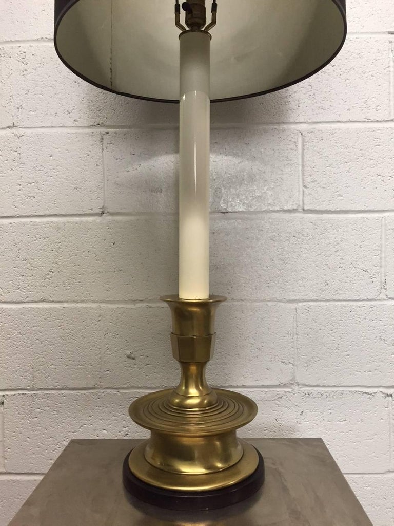 Pair of Frederick Cooper long stem brass lamps. Has a painted black wooden base. Shades not included.
Measures: 44.5