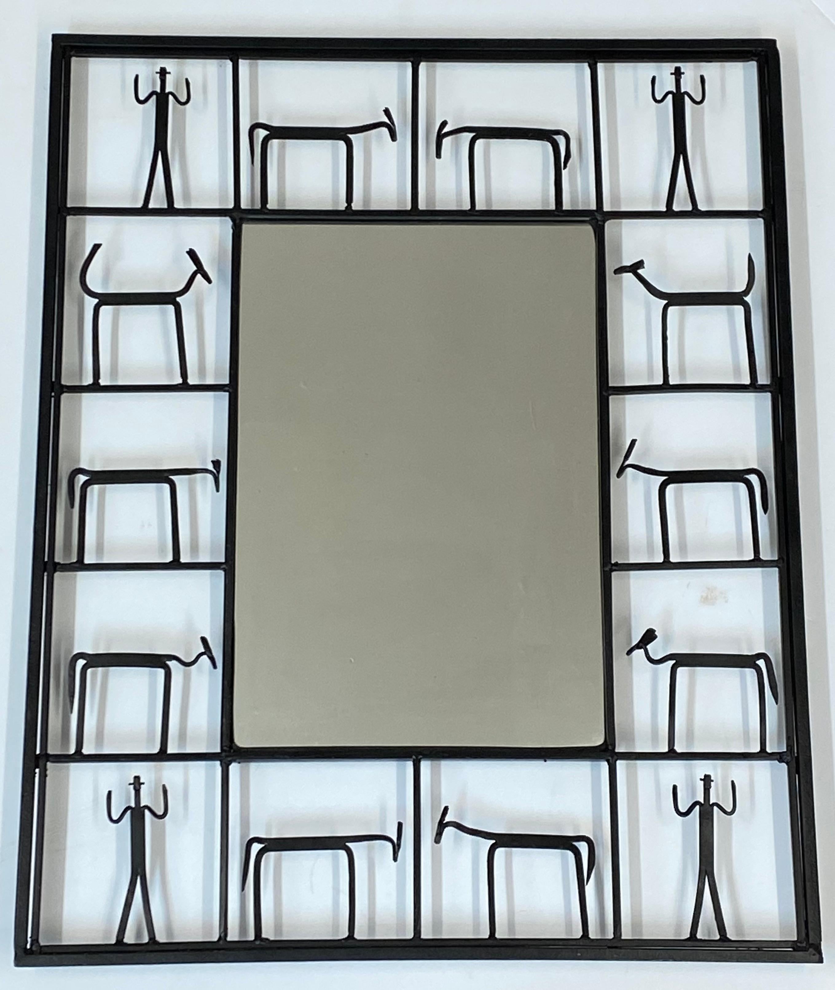 Pair of Frederick Weinberg animal & human stick figure iron framed mirrors, C.1950

Outstanding pair of mirrors

Hand crafted mirrors with an assortment of human and animal stick figures

Each mirror measures 12