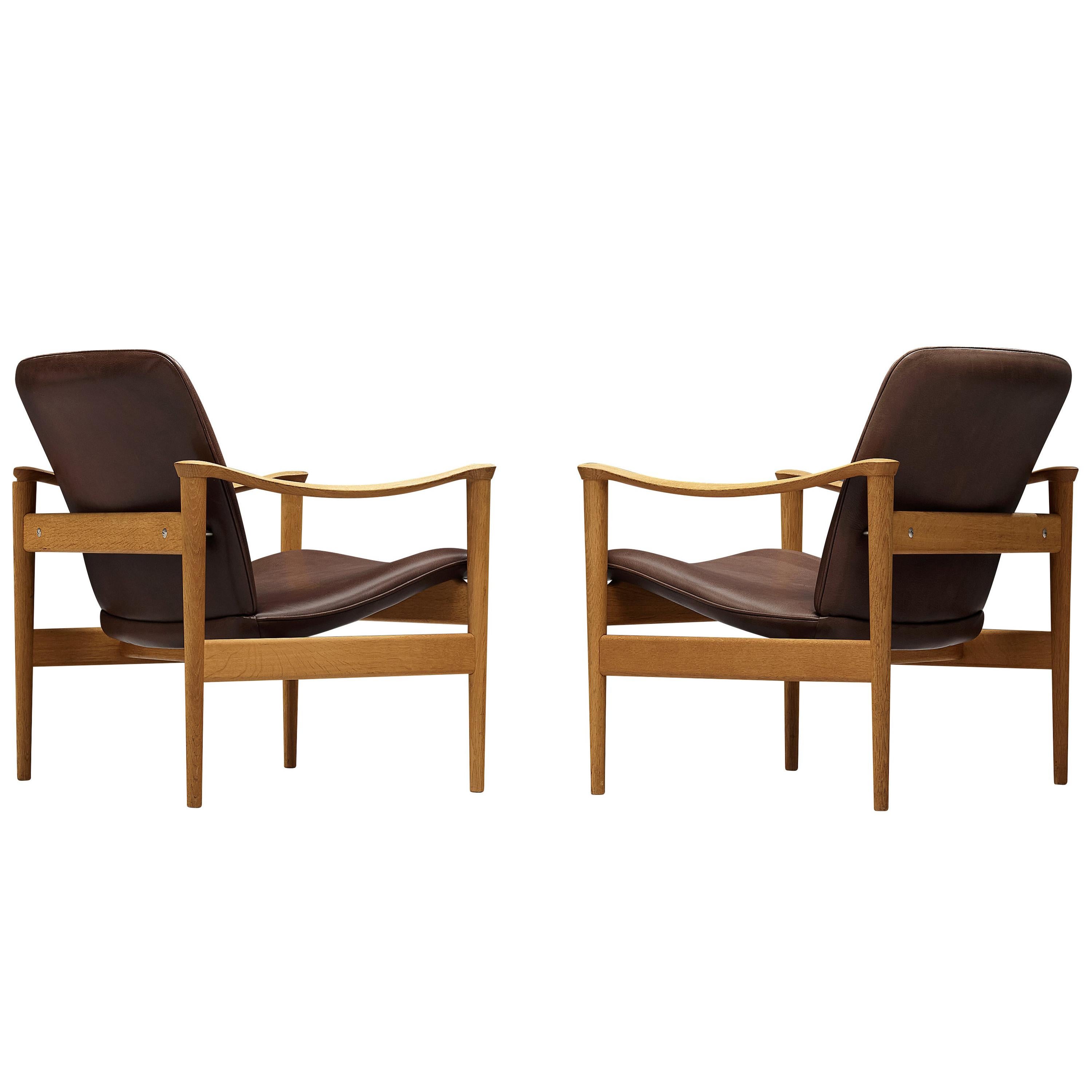 Pair of Fredrik A. Kayser Easy Chairs in Oak