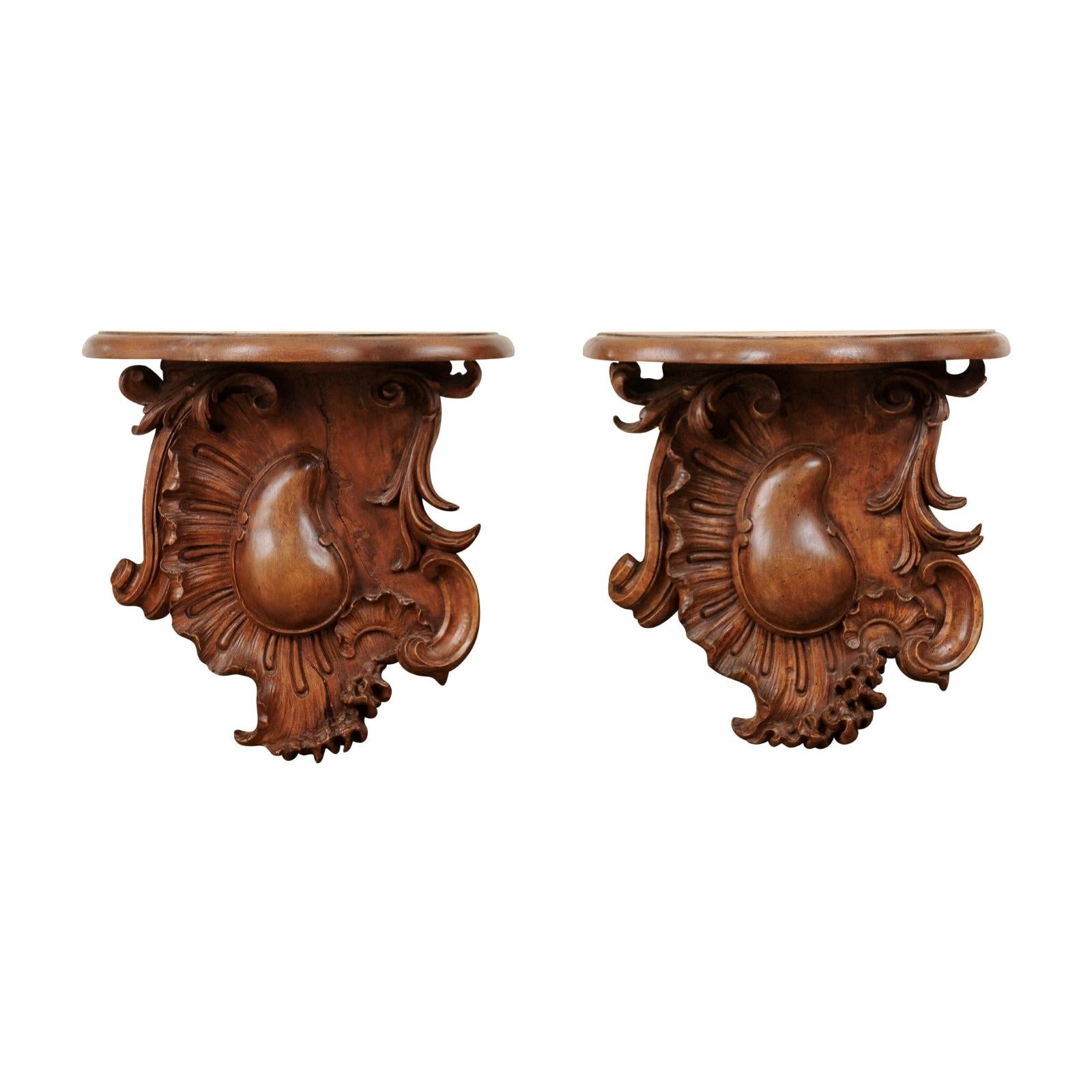 Pair of French 1760s Louis XV Period Walnut Wall Brackets with Rocailles Motifs