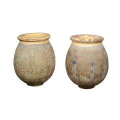 Pair of French 1800s Biot Terracotta Olive Jars with Yellow Glaze from Provence