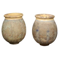 Pair of French 1800s Biot Terracotta Olive Jars with Yellow Glaze from Provence