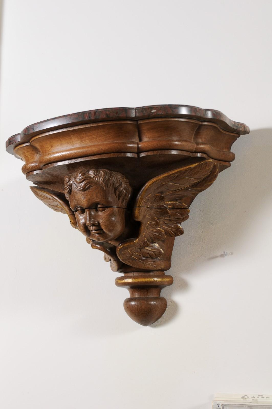 Pair of French 1880s Carved Walnut Brackets with Cherubs and Faux Marble Tops For Sale 7