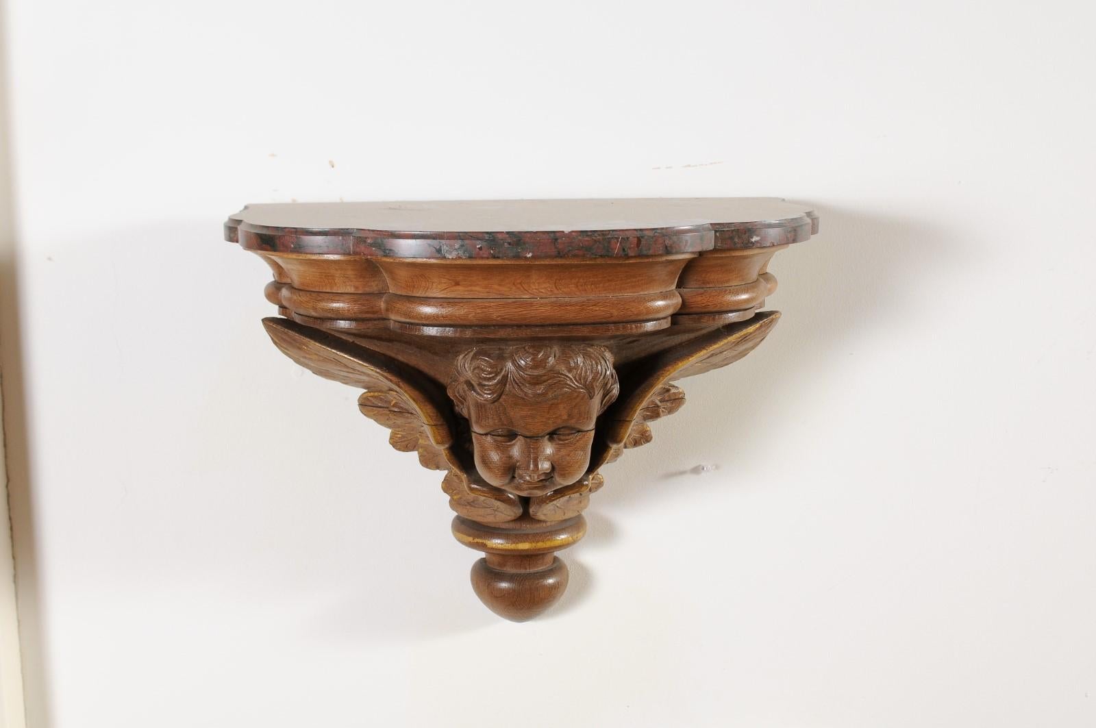 Pair of French 1880s Carved Walnut Brackets with Cherubs and Faux Marble Tops For Sale 10