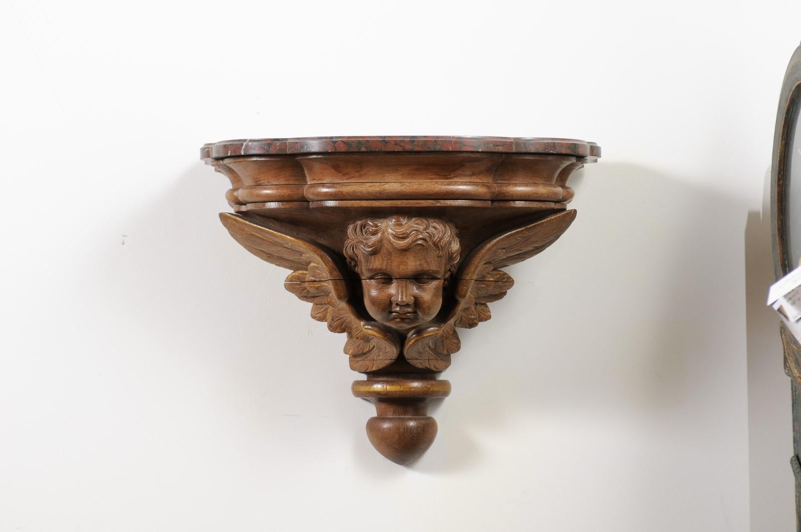 Pair of French 1880s Carved Walnut Brackets with Cherubs and Faux Marble Tops In Good Condition For Sale In Atlanta, GA