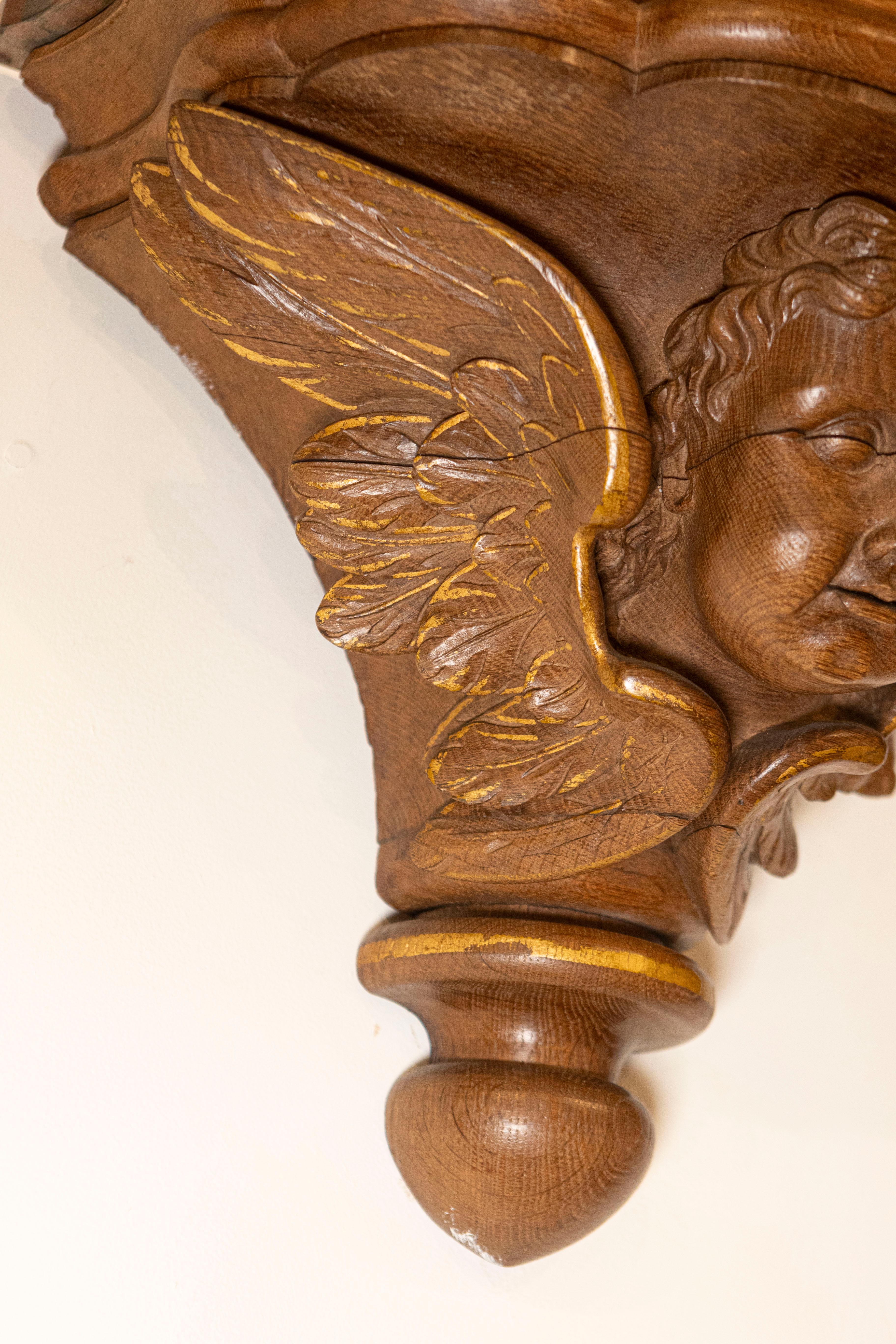 Pair of French 1880s Carved Walnut Brackets with Cherubs and Faux Marble Tops For Sale 1